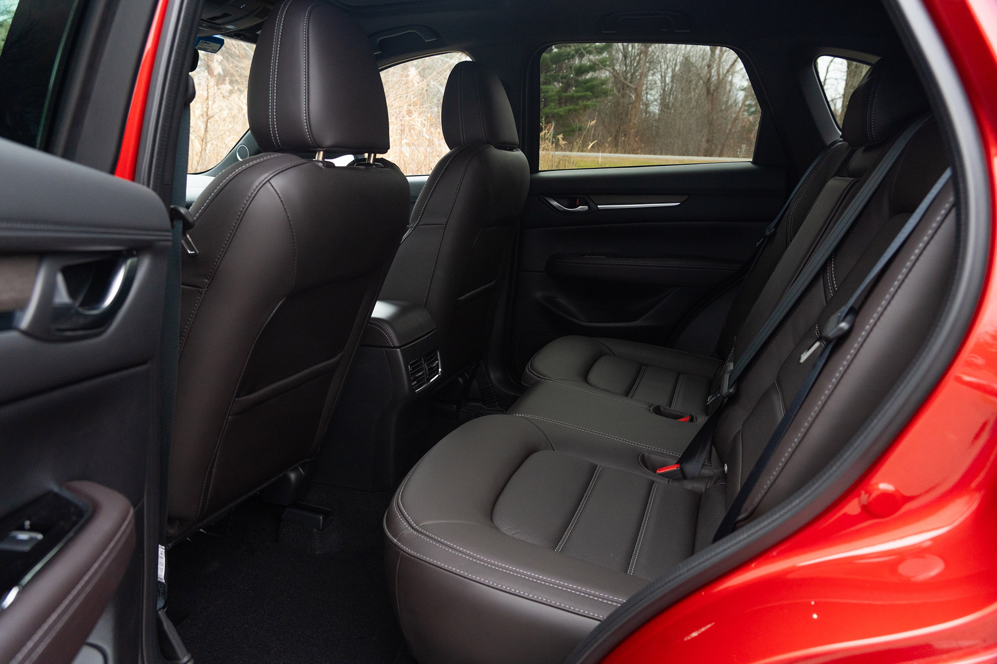 Back seat of 2024 Mazda CX-5 in red.
