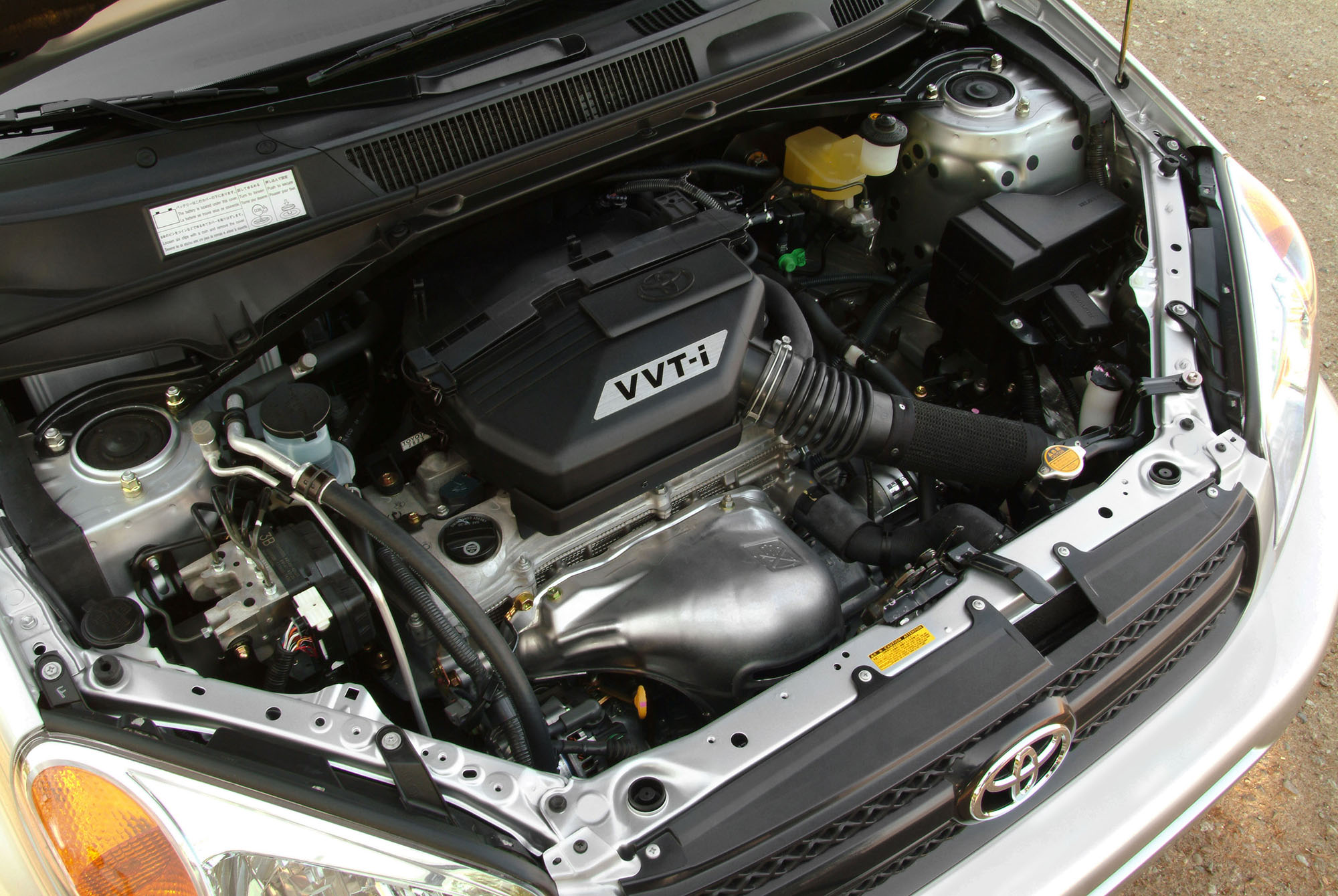 Toyota RAV4 with hood open and engine exposed