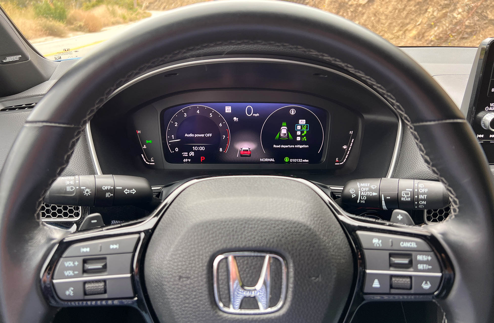 2024 Honda Civic Hatchback digital instrumentation behind steering wheel