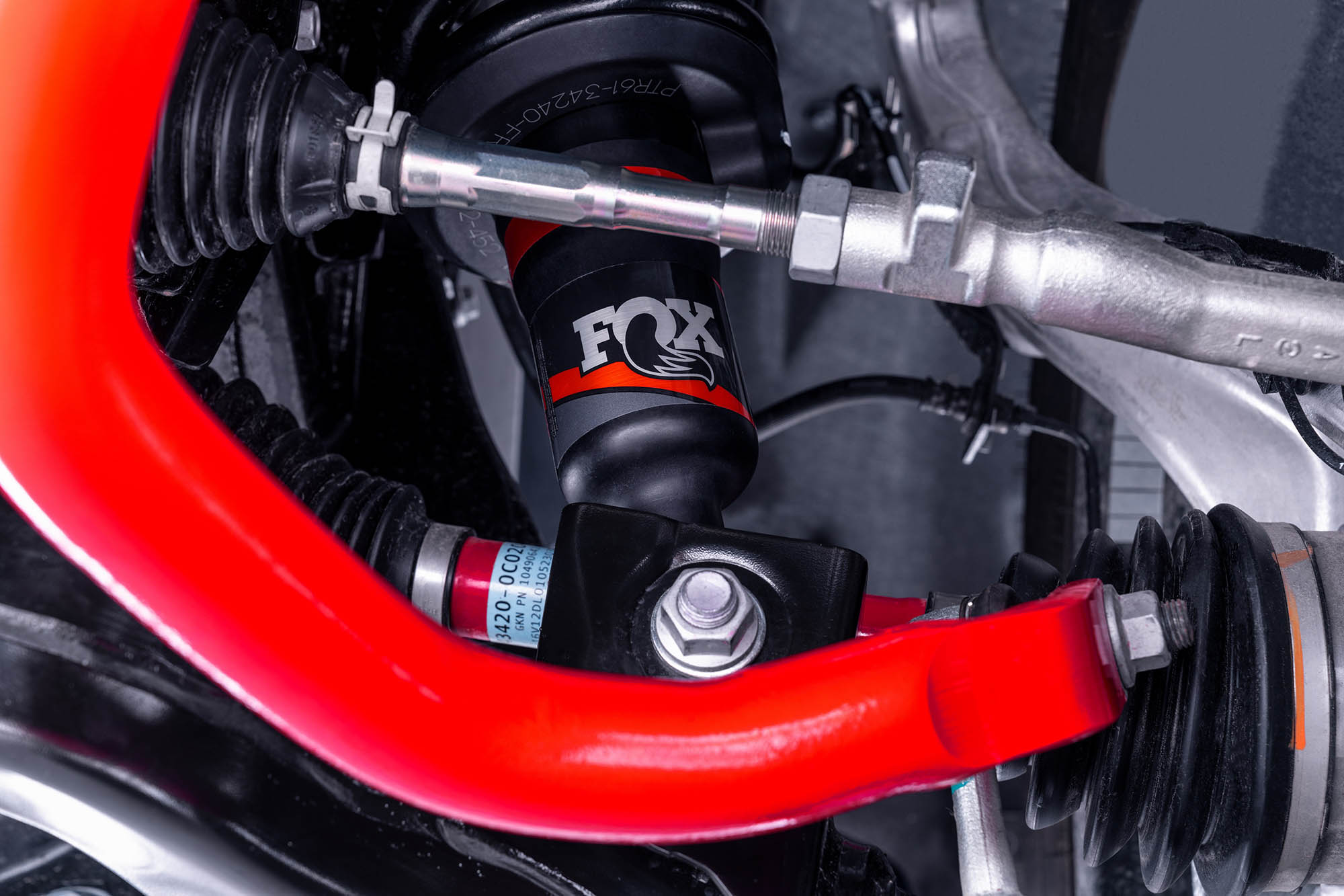 A red stabilizer bar on a 2024 Toyota Tundra