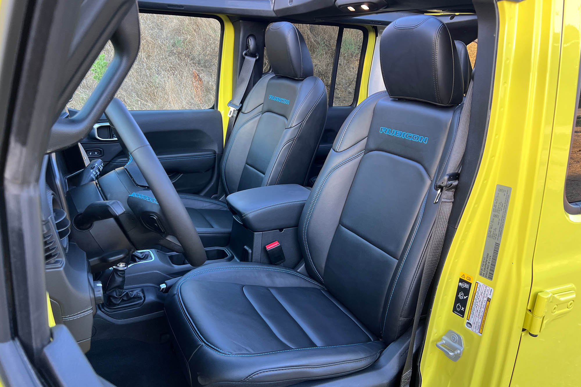 The front seats of a 2024 Jeep Wrangler Rubicon 4xe