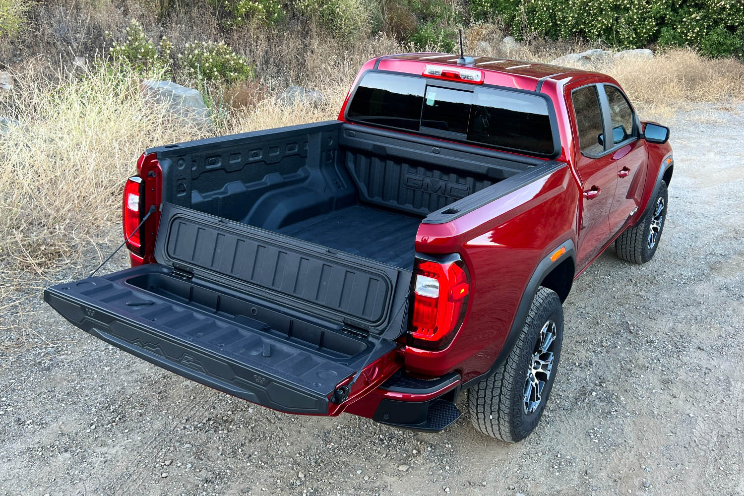 Cargo bed of a 2023 GMC Canyon showing tailgate storage