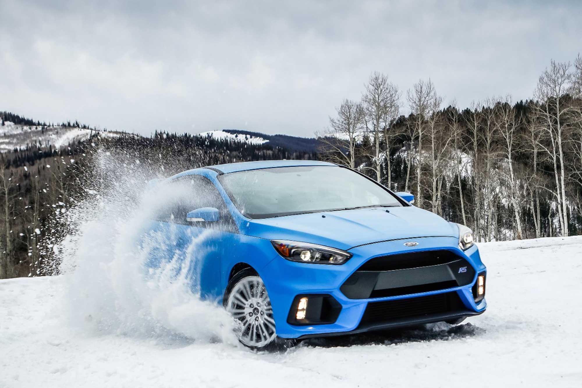 Blue 2016 Ford Focus RS in snow