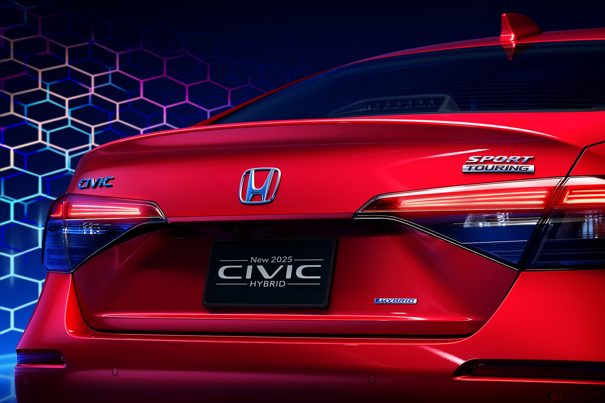 Detail view of the back of a red 2025 Honda Civic Hybrid 