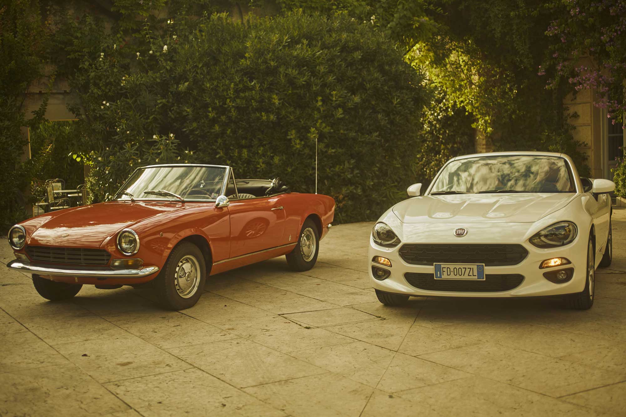 Classic and redesigned Fiat 124 Spider