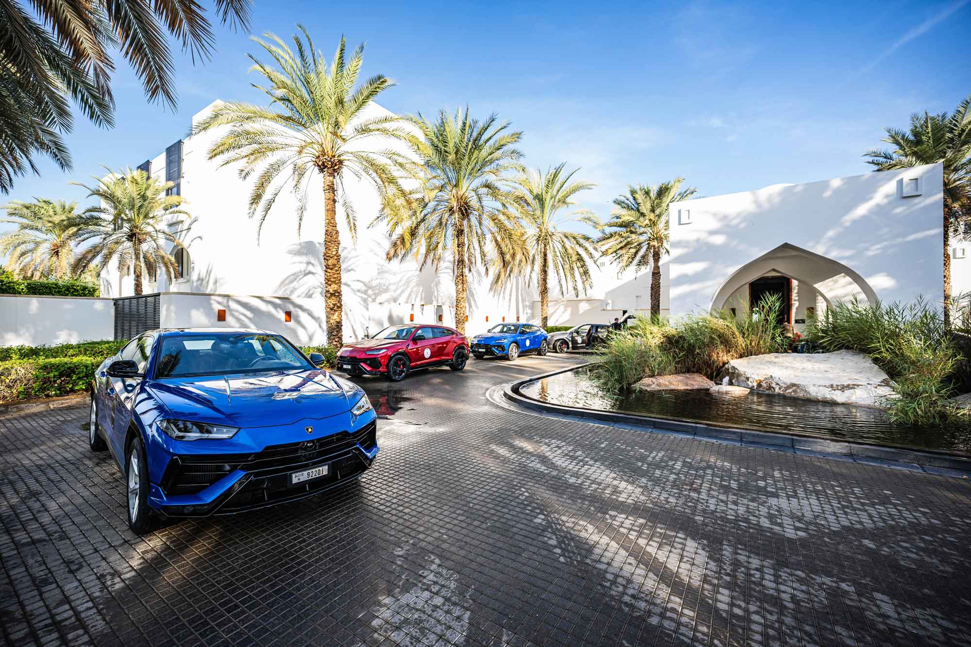Blue and red Lamborghini Urus