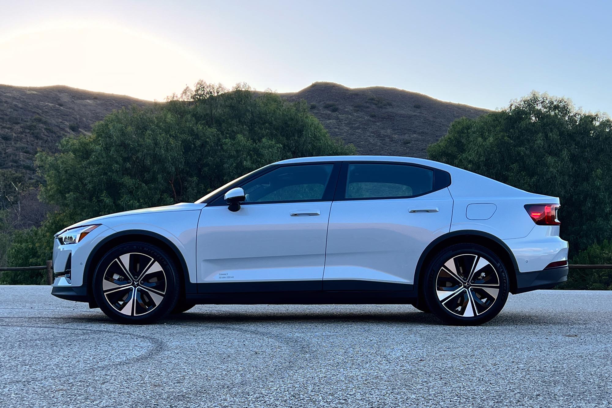 Side view of a white 2024 Polestar 2