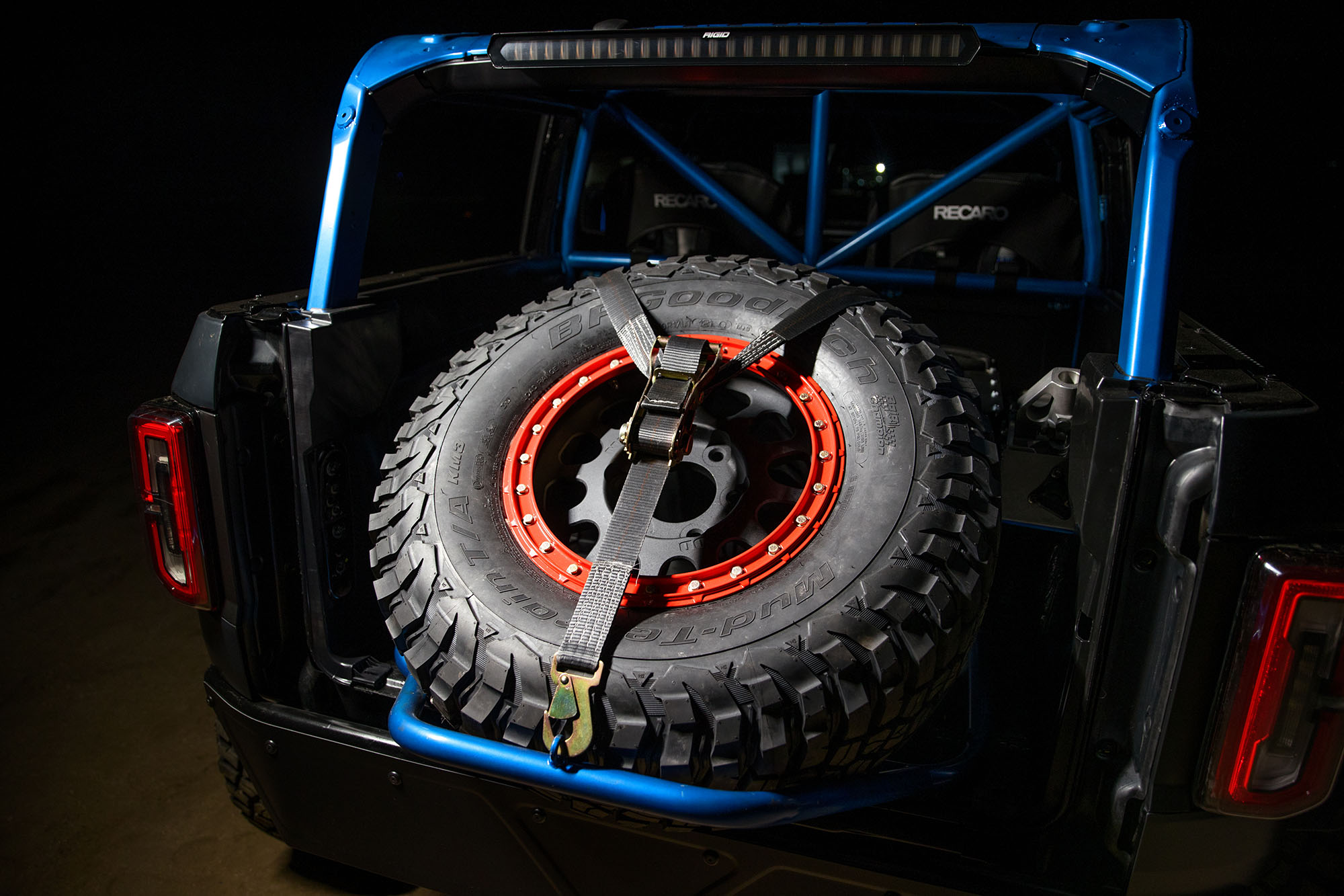A beadlock wheel in the back of a 2021 Ford Bronco 4600 race vehicle
