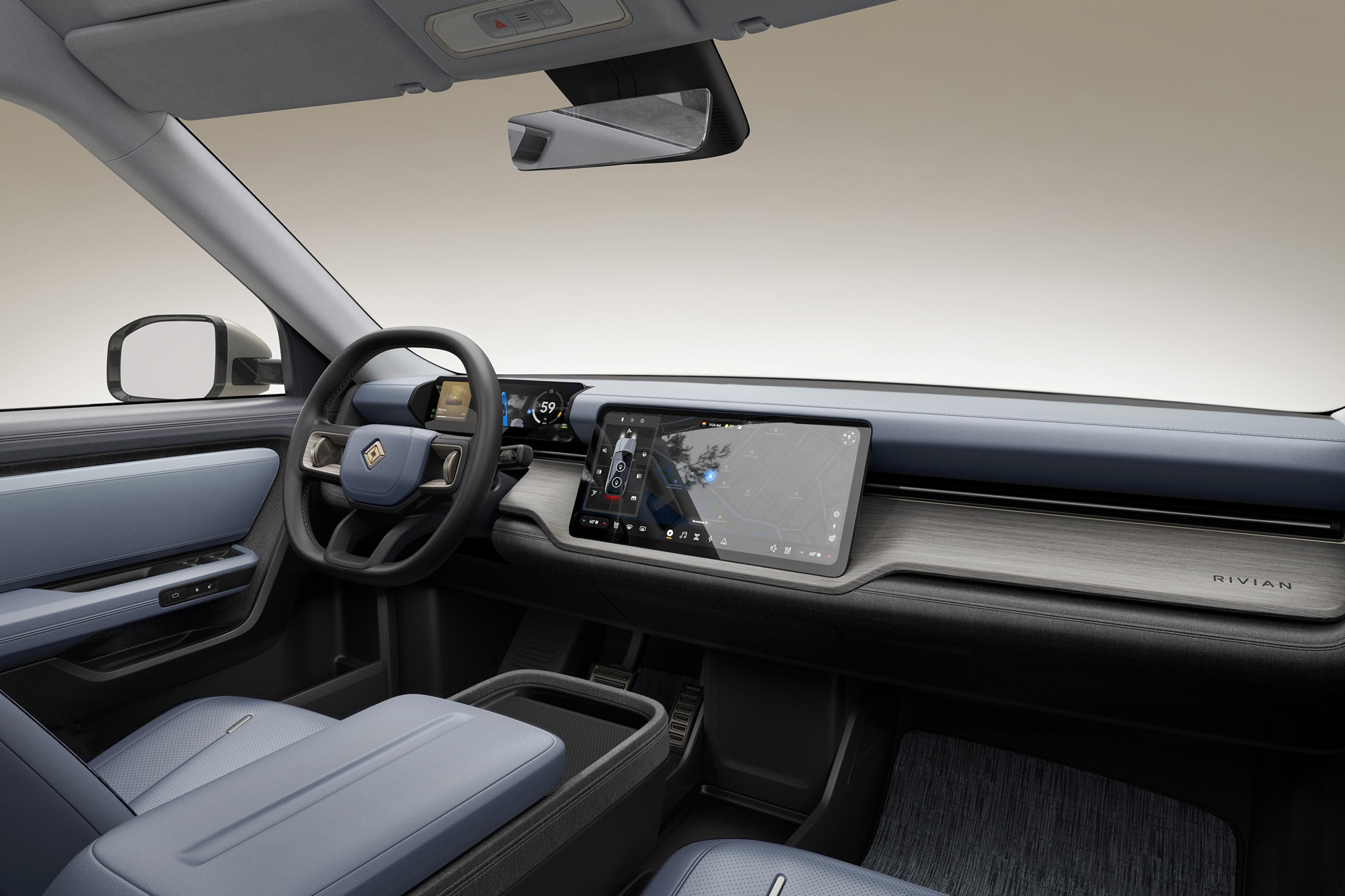 2026 Rivian R2 interior, infotainment screen, and steering wheel.