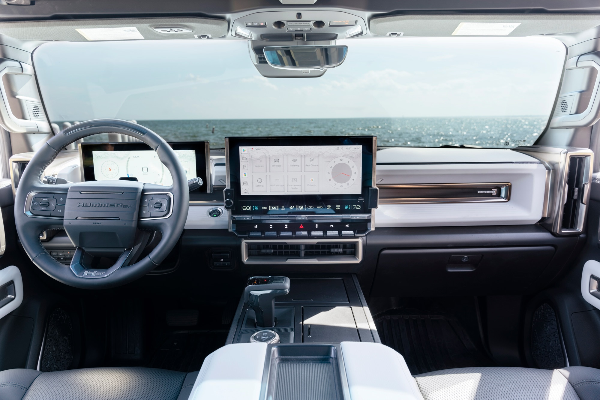 2024 GMC Hummer EV Pickup interior and infotainment screen.