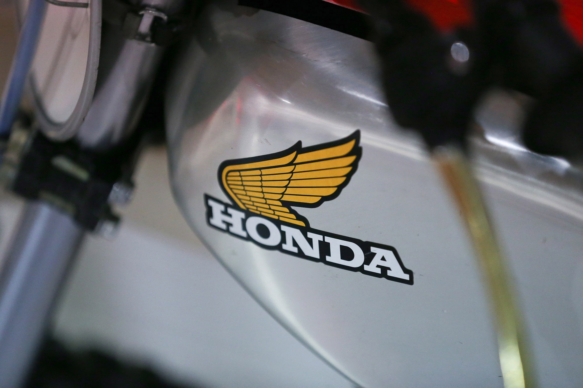 Honda logo with wings on motorcycle tank