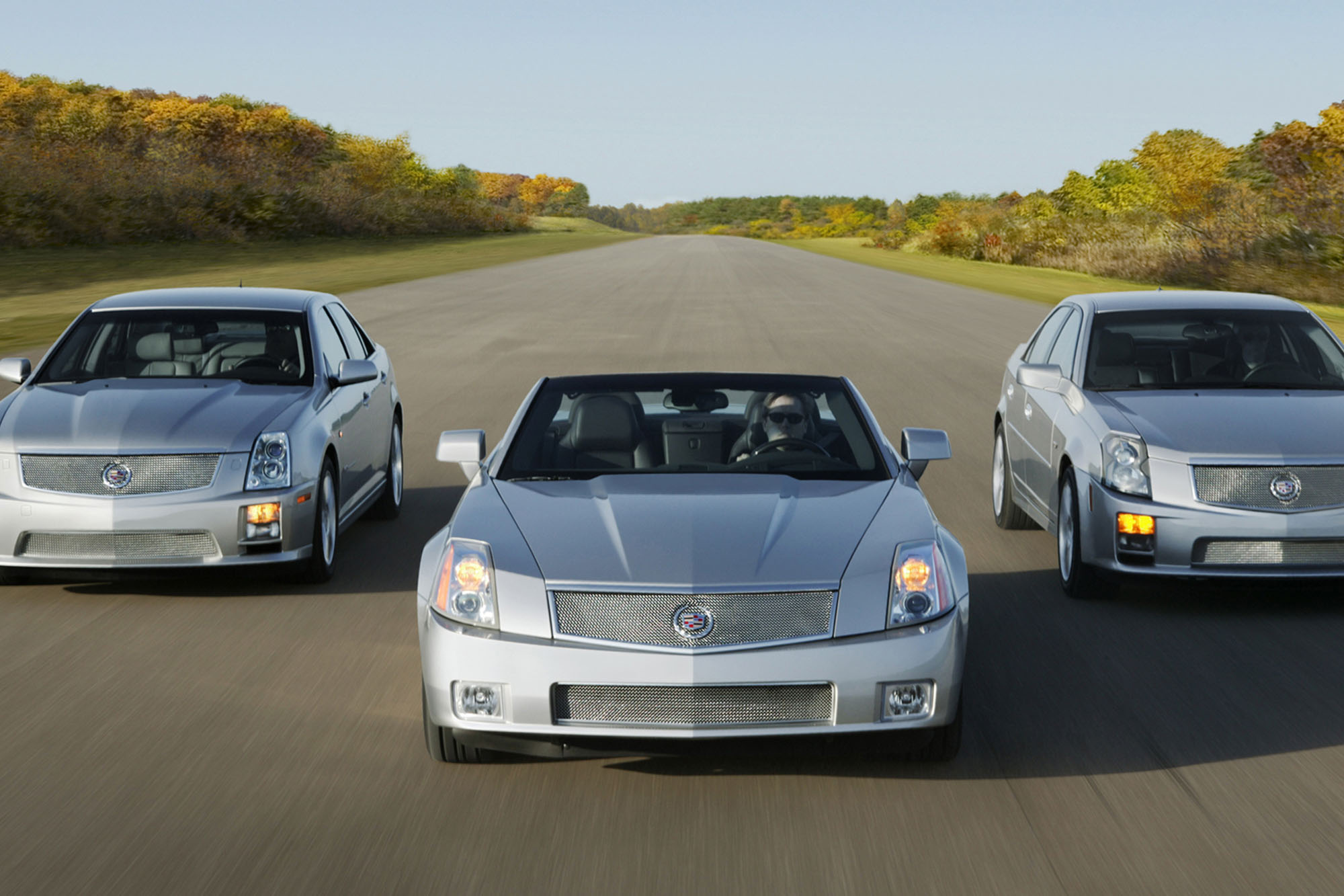 2000s-era Cadillac STS-V sedan, XLR-V roadster, and CTS-V sedan