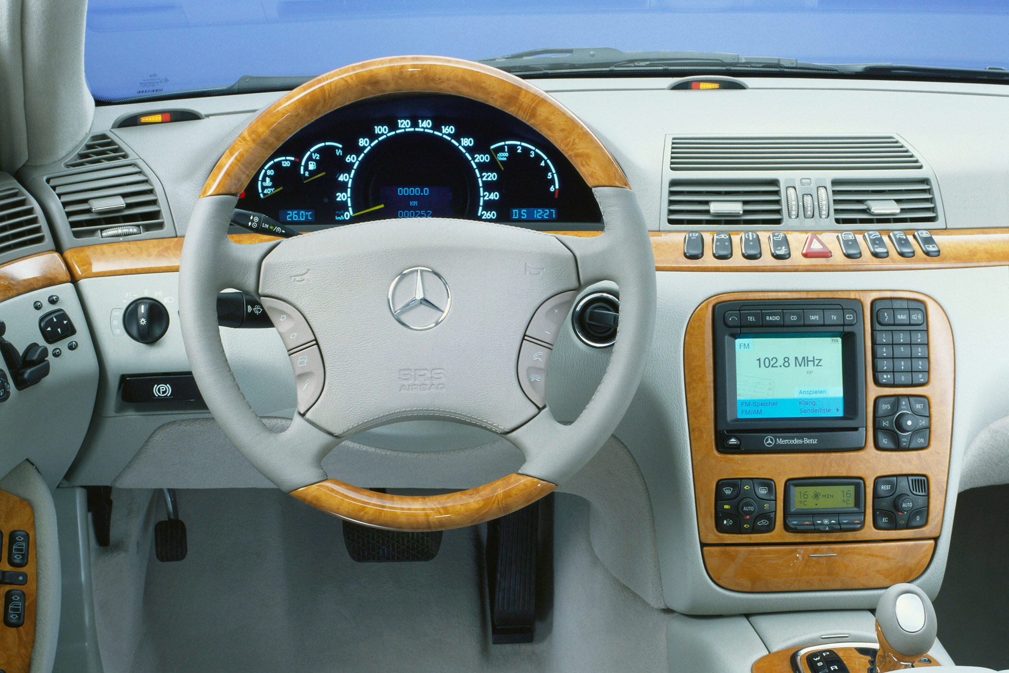 2004 Mercedes-Benz S-Class interior, steering wheel, and radio.