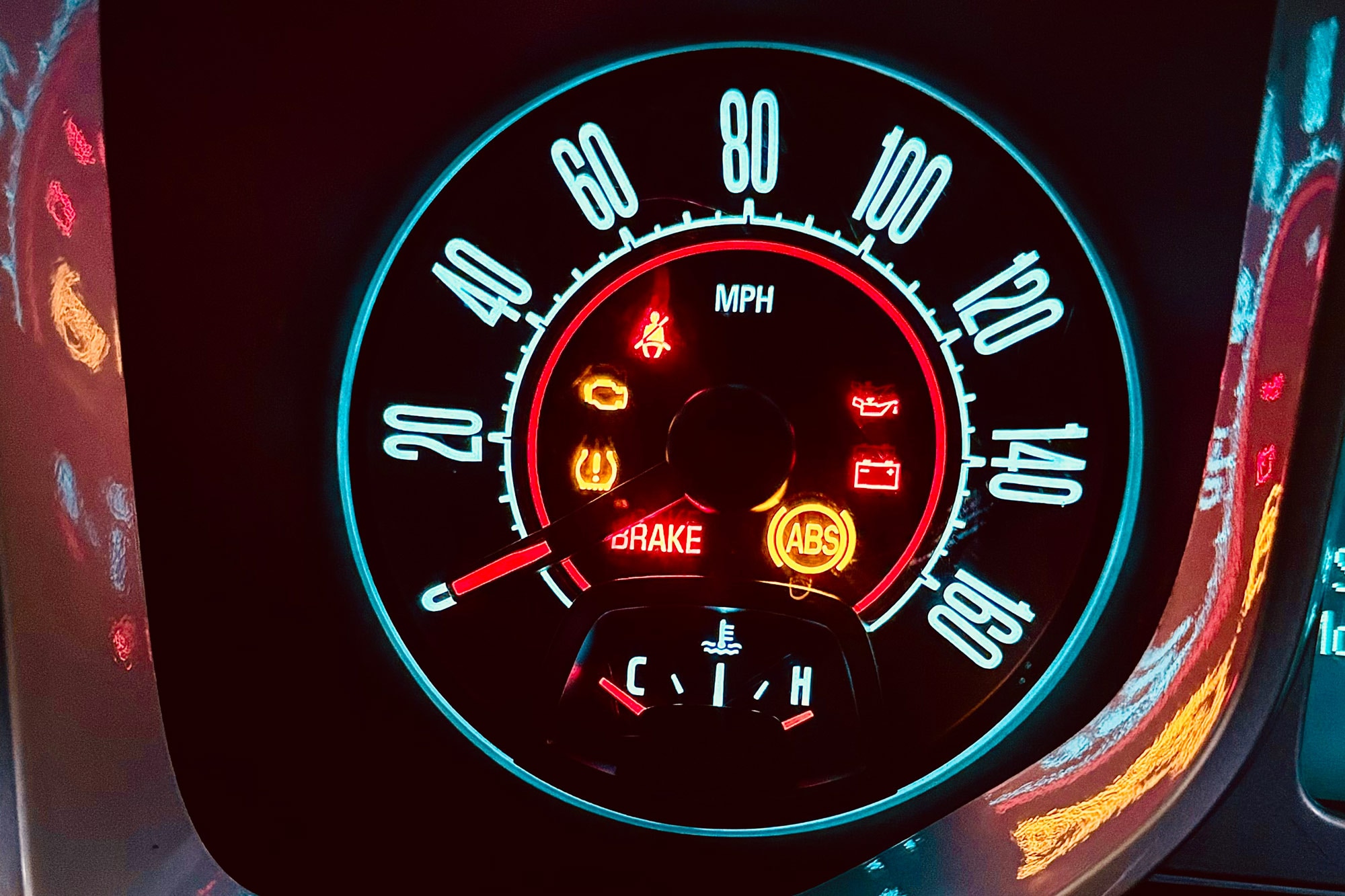 A driver gauge displaying several warning lights