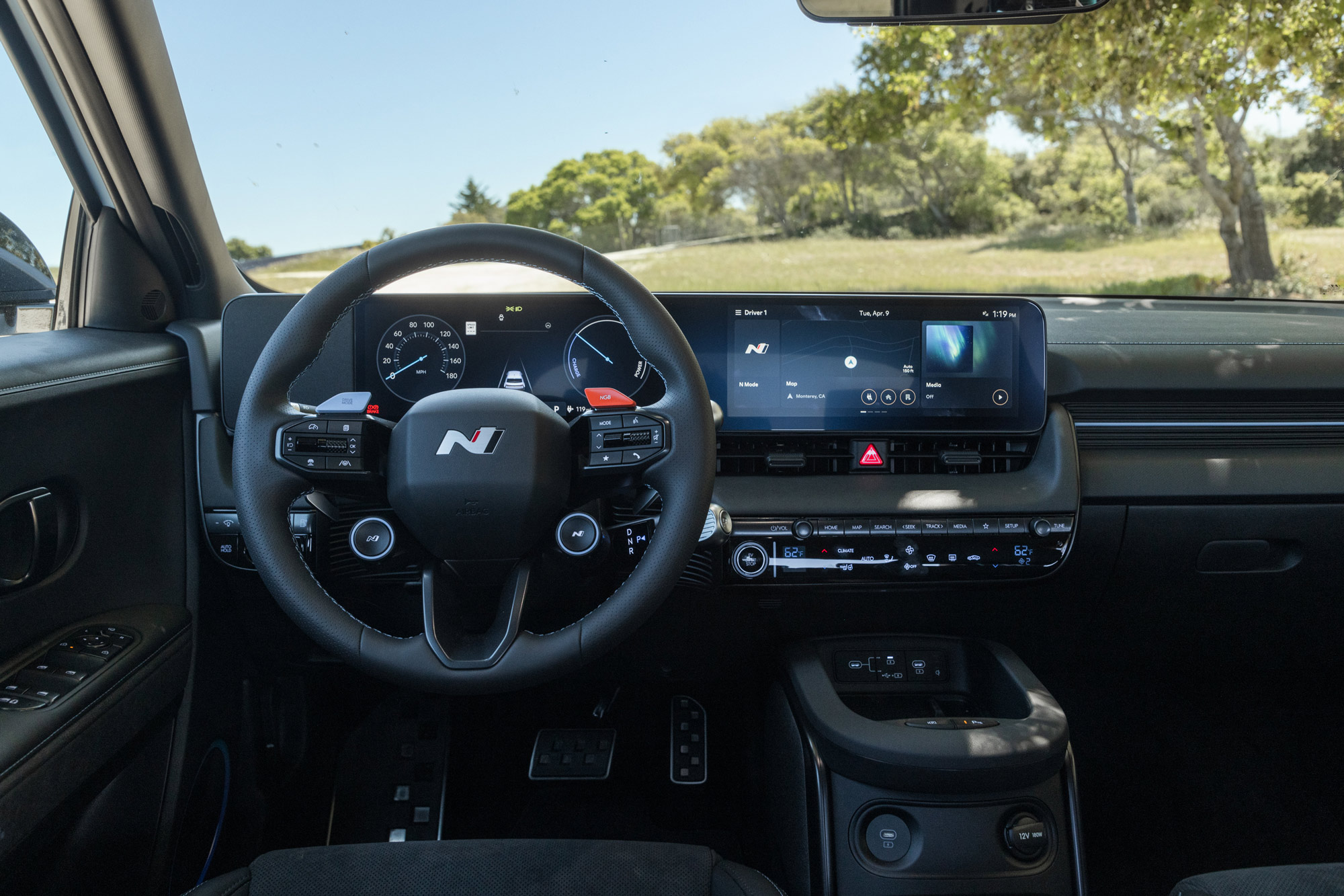 View of the 2025 Hyundai Ioniq N model's dashboard and dual display screens.