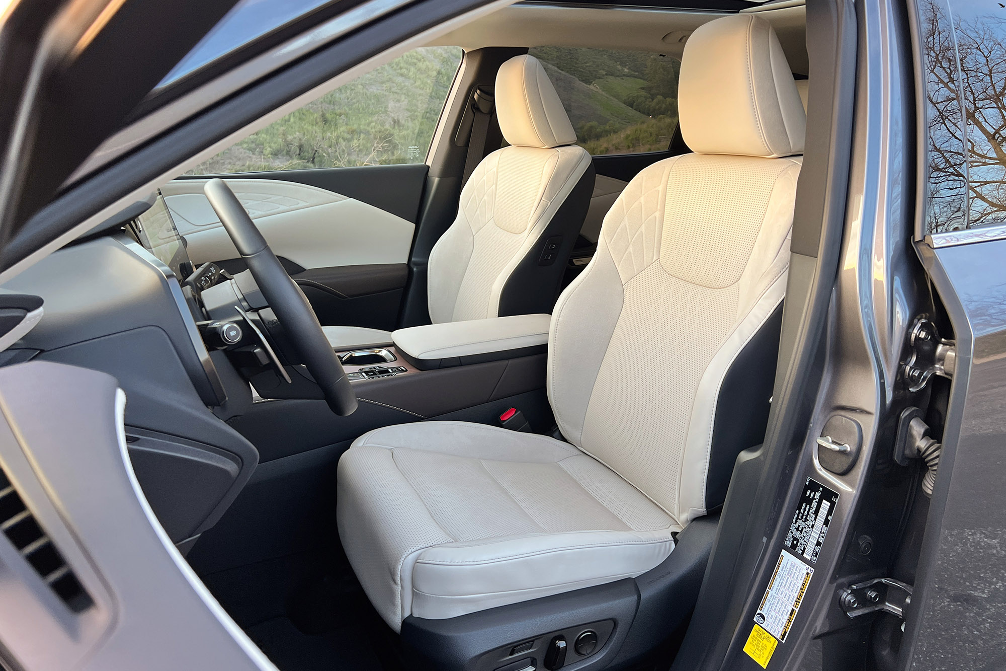 View of the front seats in a 2024 Lexus RX 450h+ plug-in hybrid.