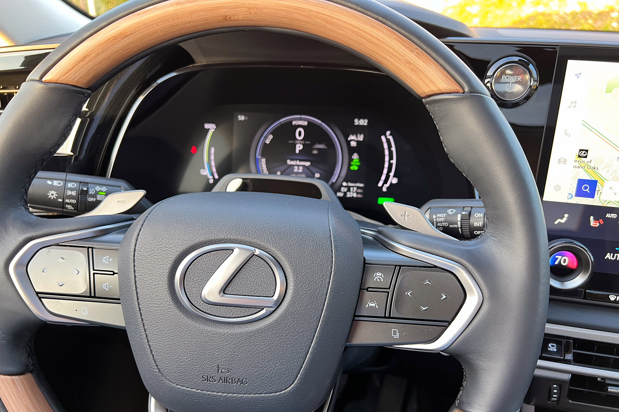 Steering wheel controls in a 2024 Lexus RX 450h+ plug-in hybrid.