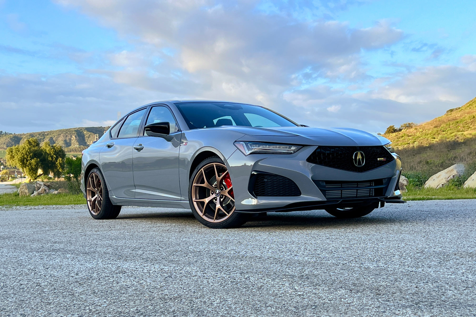 Front view of a 2024 Acura TLX Type S in Urban Gray with copper-finish 20-inch wheels
