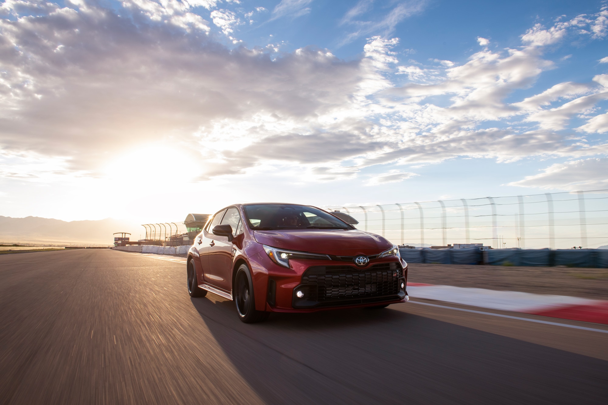 2024 Toyota GR Corolla driving on race track.