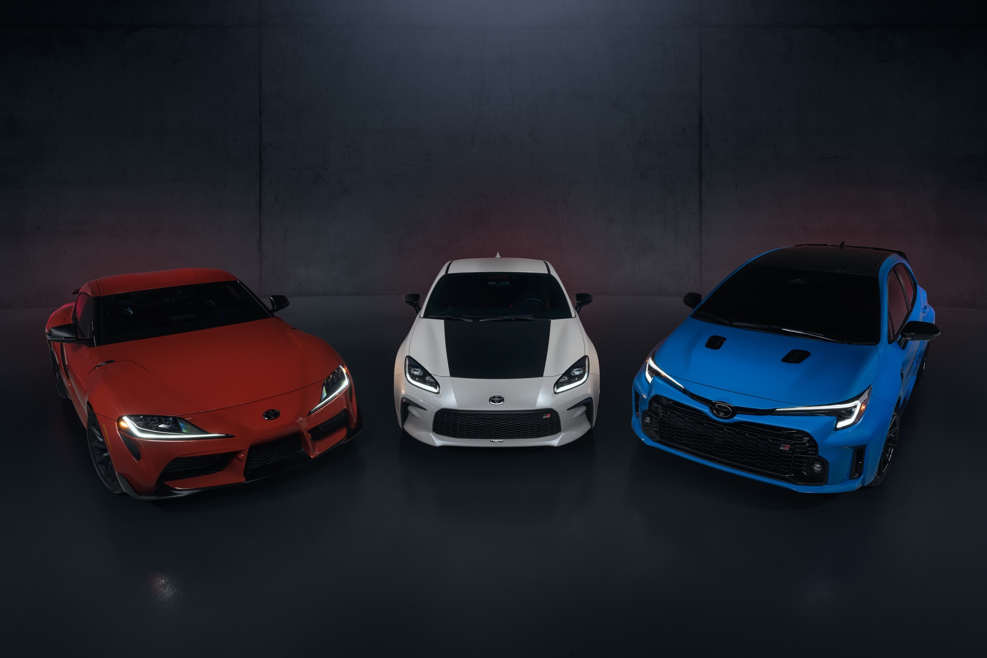 Trio of 2024 Toyota GR models, GR Supra, GR 86, and GR Corolla.
