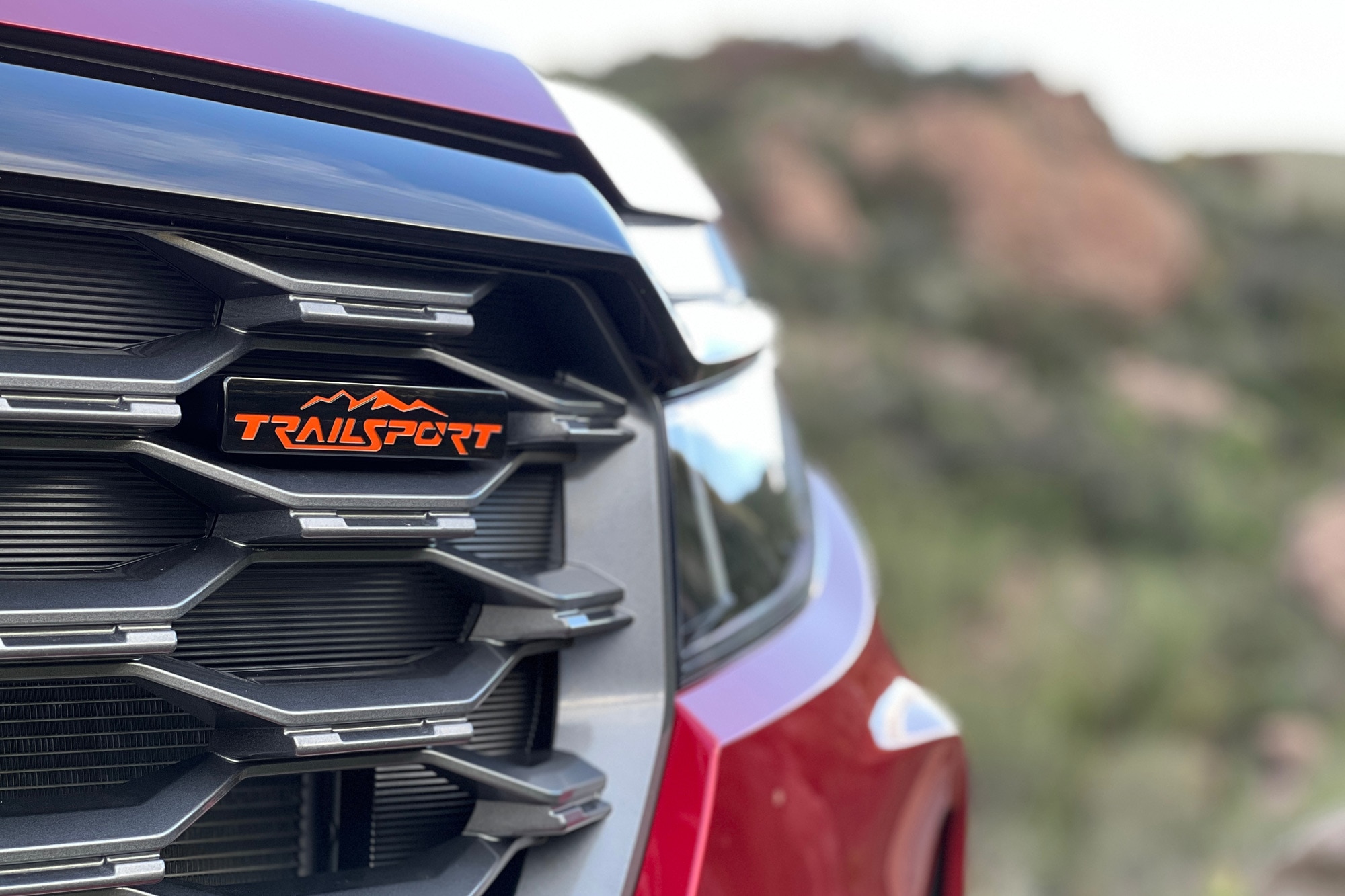 TrailSport emblem on the grille of a 2024 Honda Ridgeline.