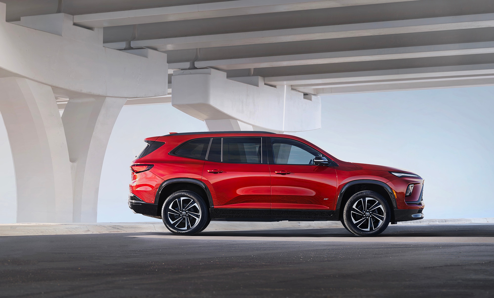 2025 Buick Enclave Sport Touring in red, side profile