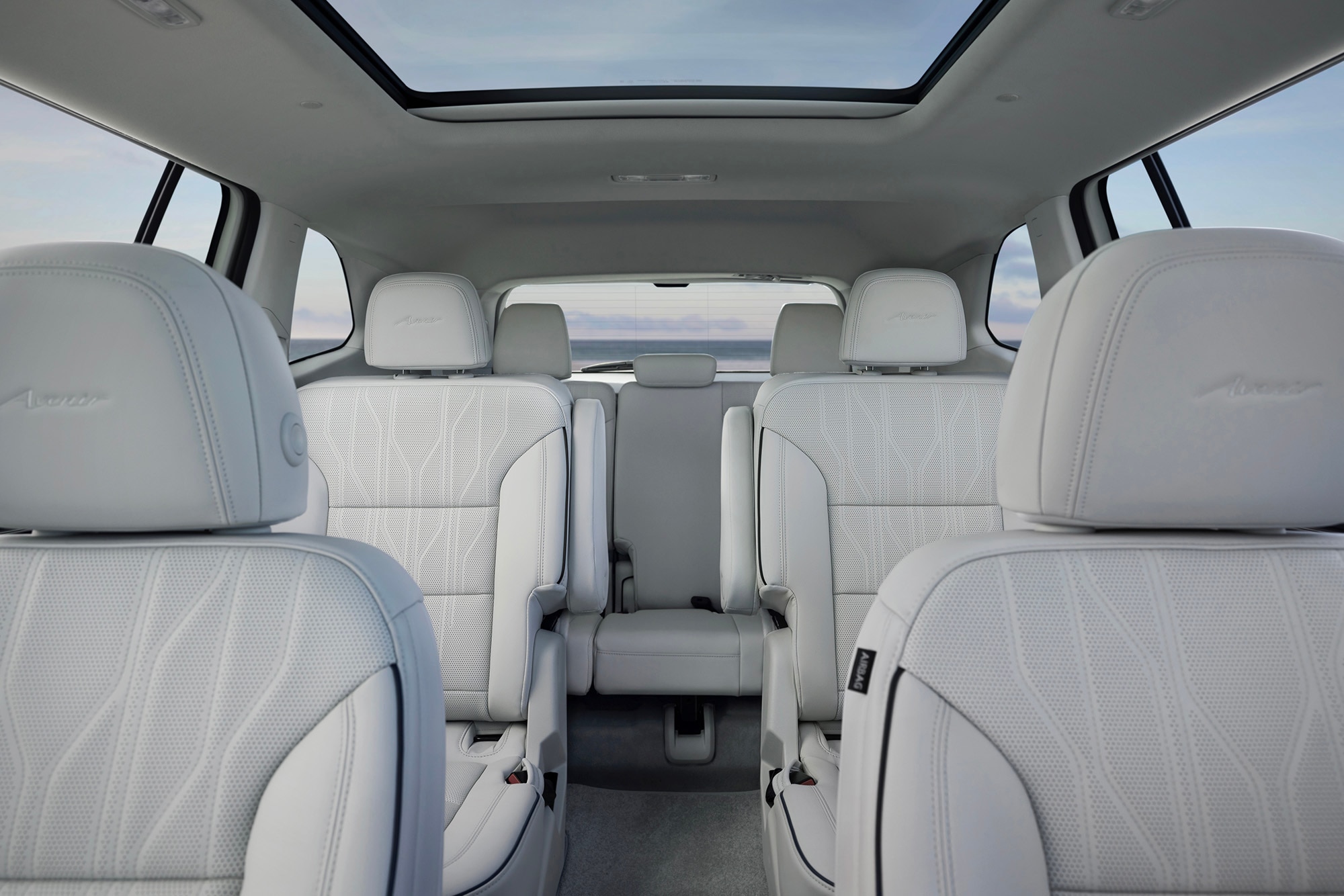 2025 Buick Enclave Avenir three-row interior with white seats