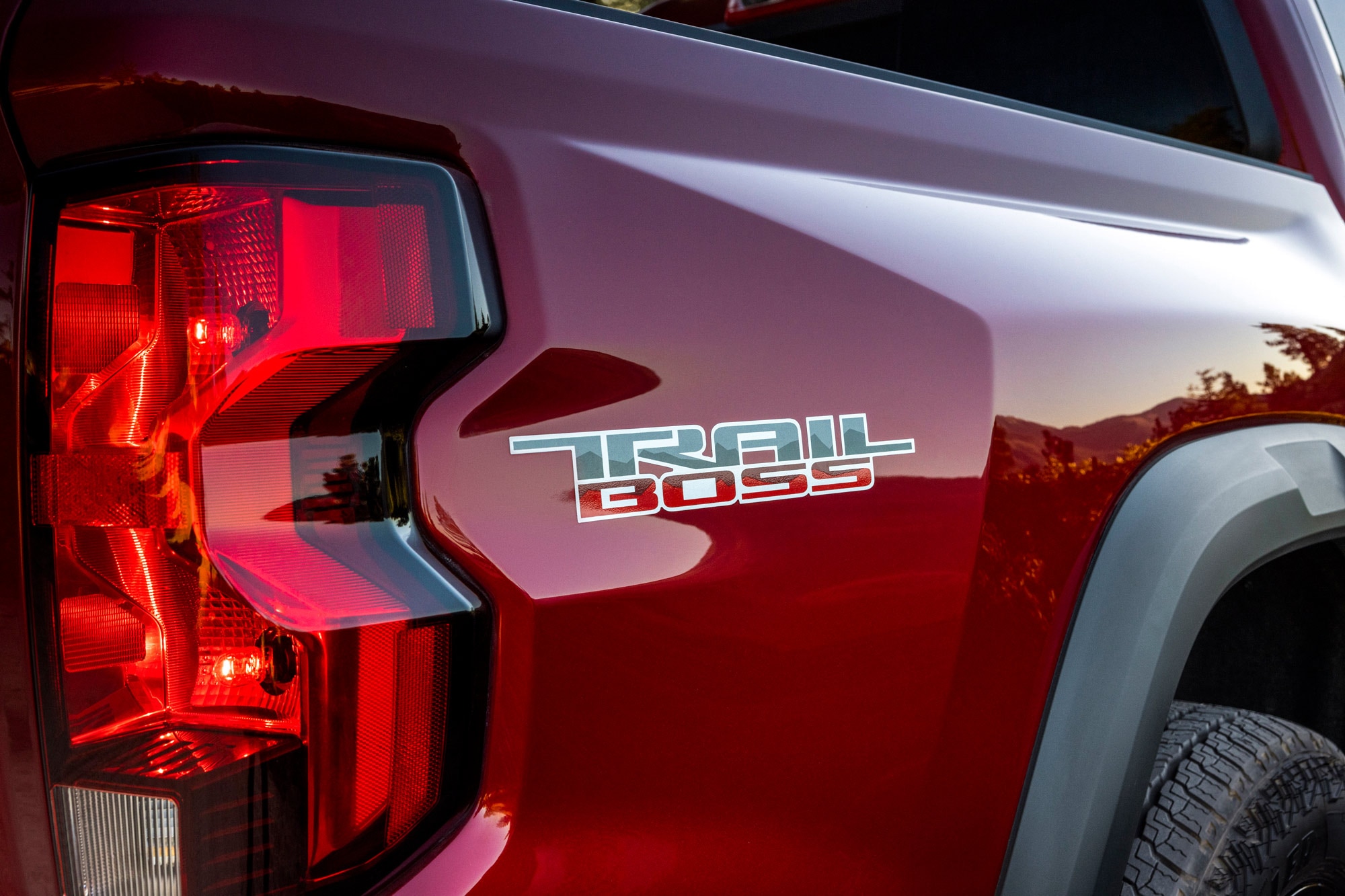 Close-up of Trail Boss logo on rear fender of Colorado truck.