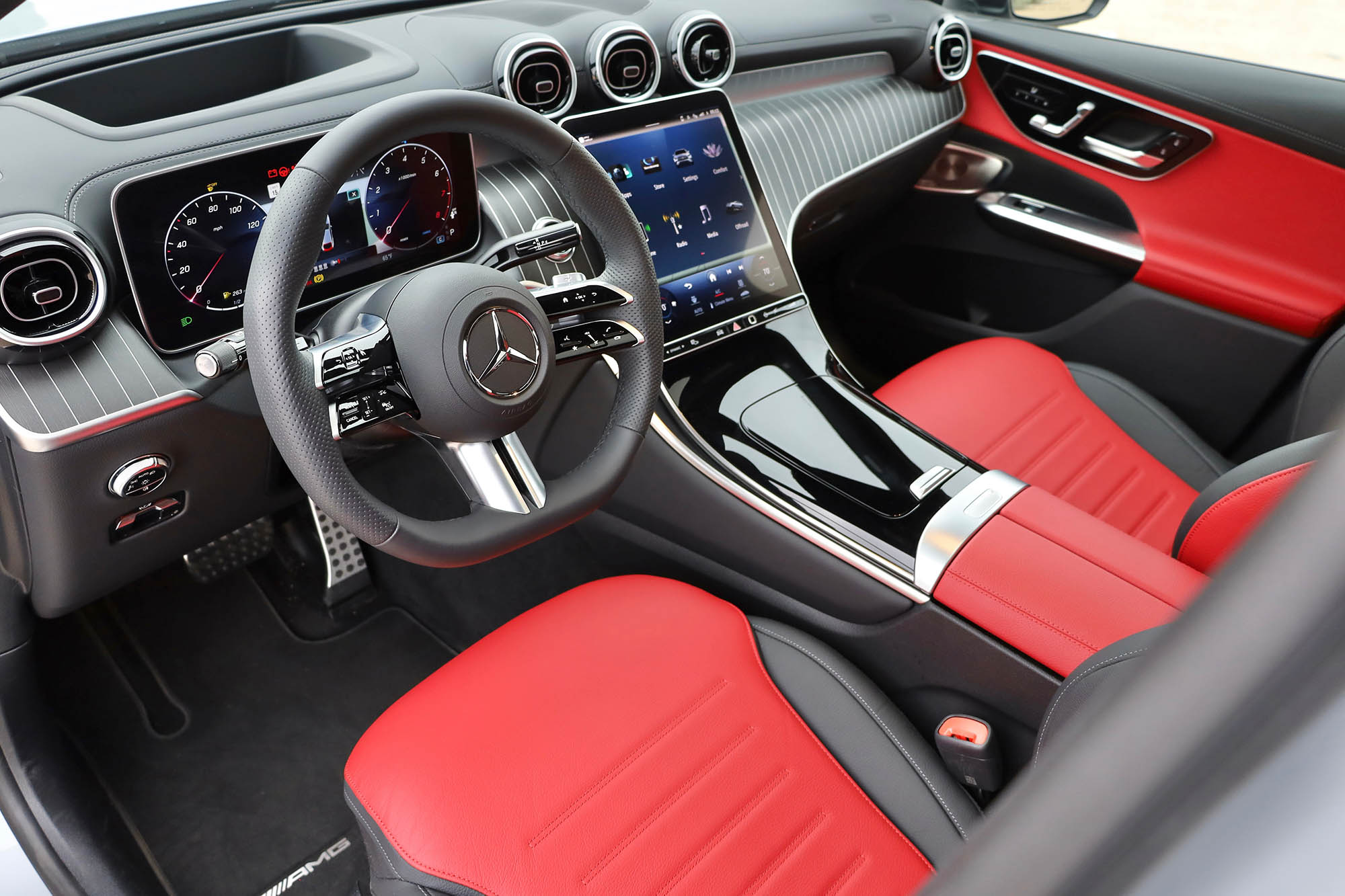 View of the dashboard and front seats in a 2024 Mercedes-Benz GLC 300 Coupe.