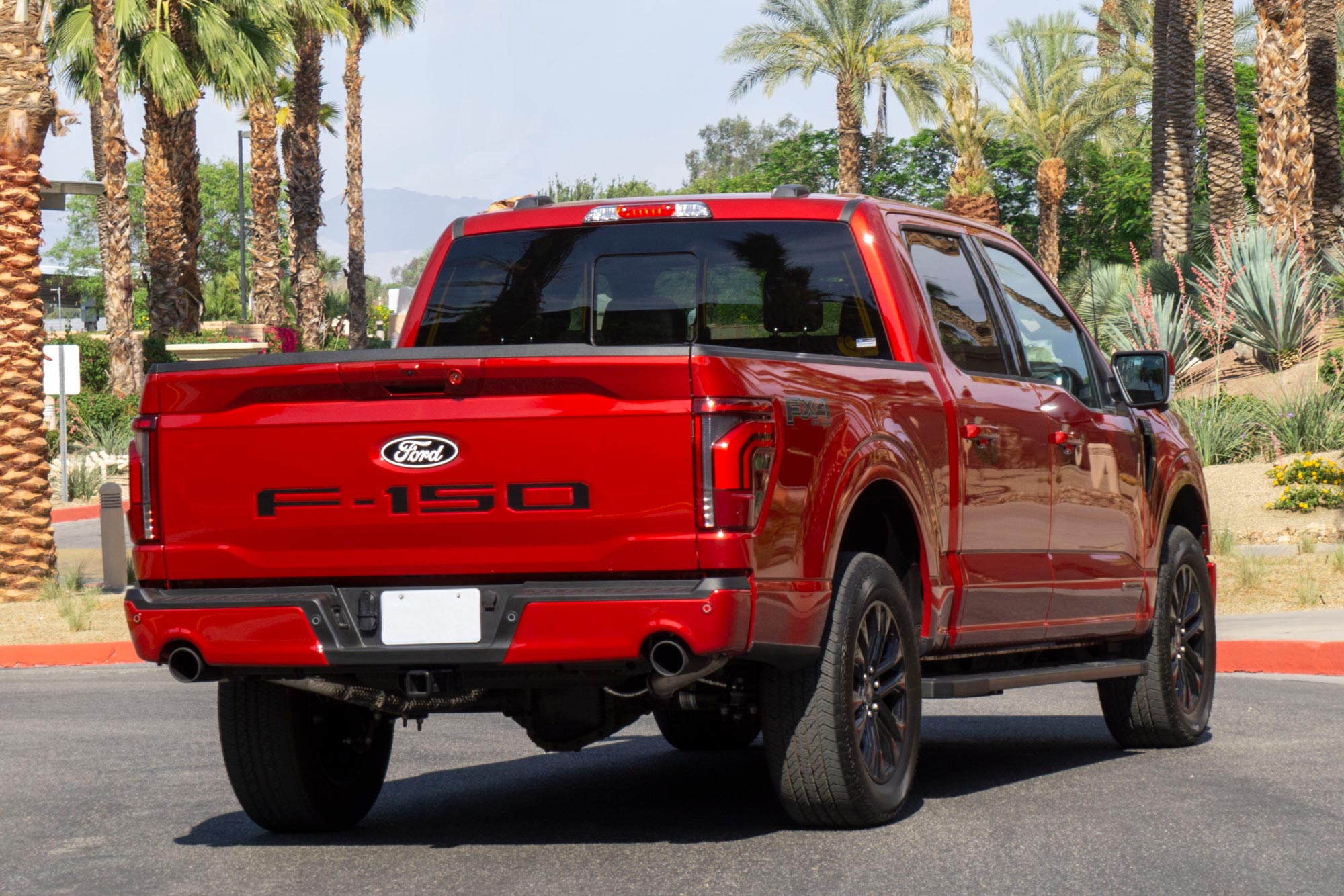 Rear of a red 2024 Ford F-150 Lariat