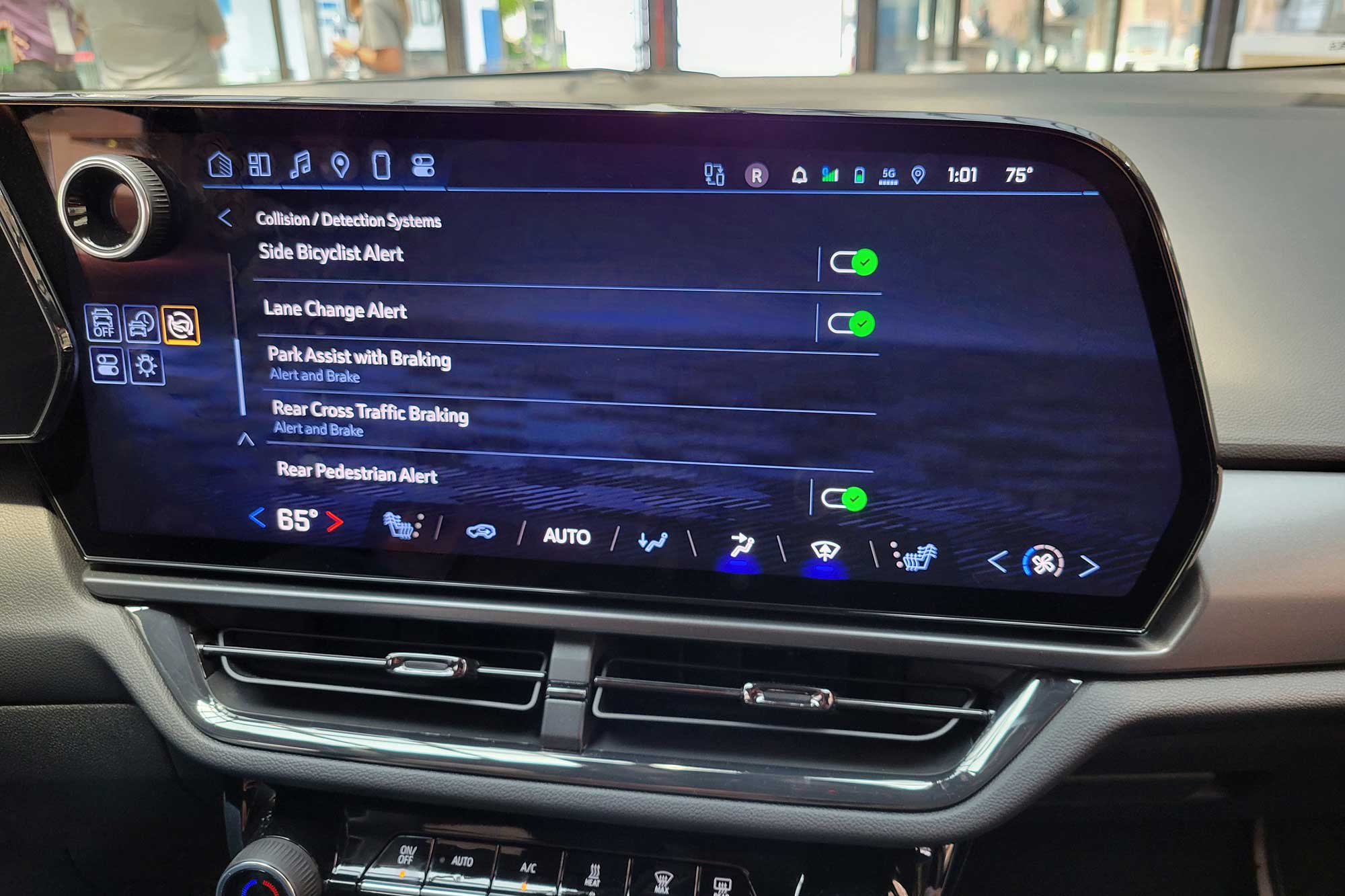 View of a 2024 Chevrolet Equinox EV interior showing the safety features menu on the infotainment screen