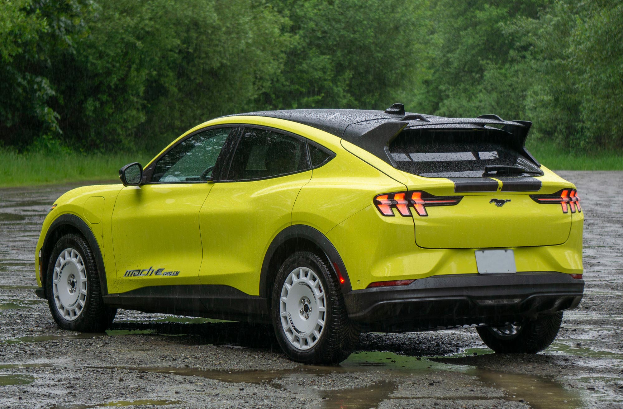 Rear of a Grabber Yellow 2024 Ford Mustang Mach-E Rally