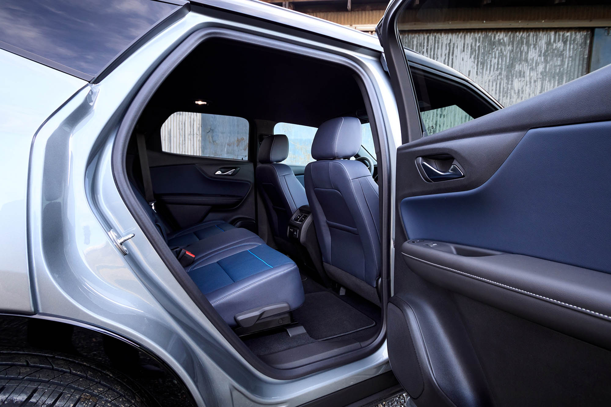 View of the 2024 Chevrolet Blazer's back seat through the right rear door.