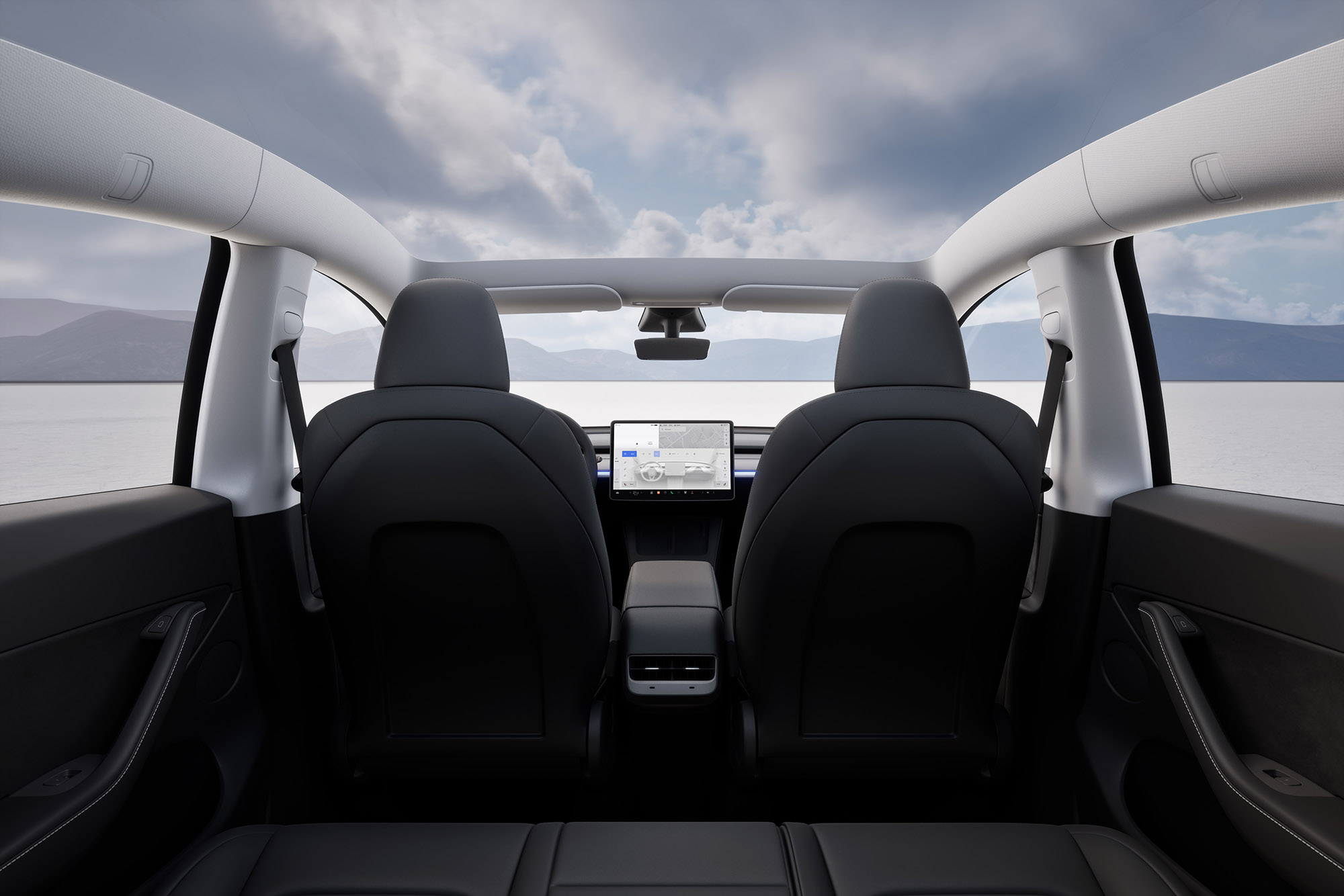 Tesla Model Y view from the back seat.