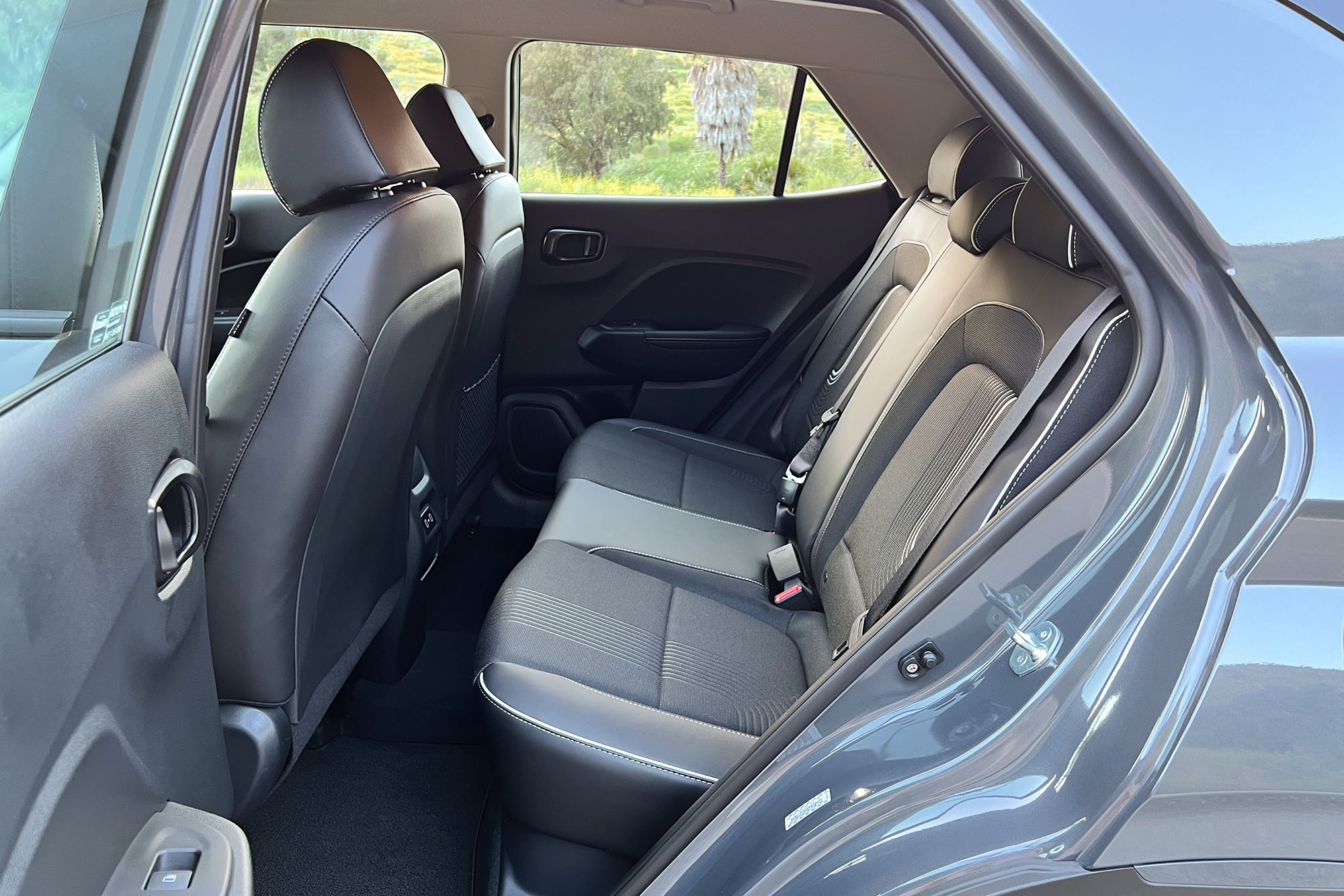 View of a 2024 Hyundai Venue Limited interior showing the back seat.