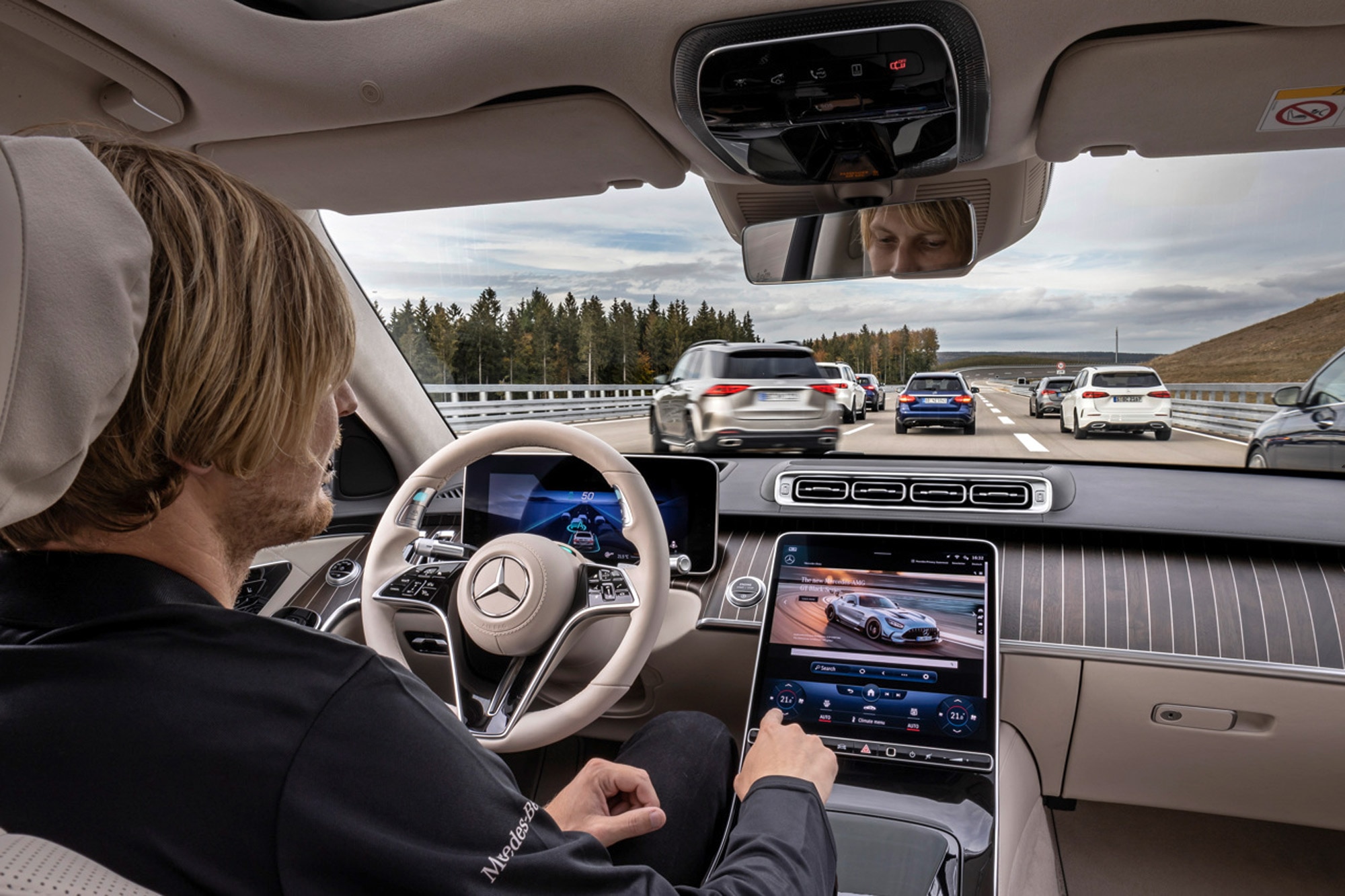 A driver demonstrates how Level 3 autonomous control works in a Mercedes-Benz.