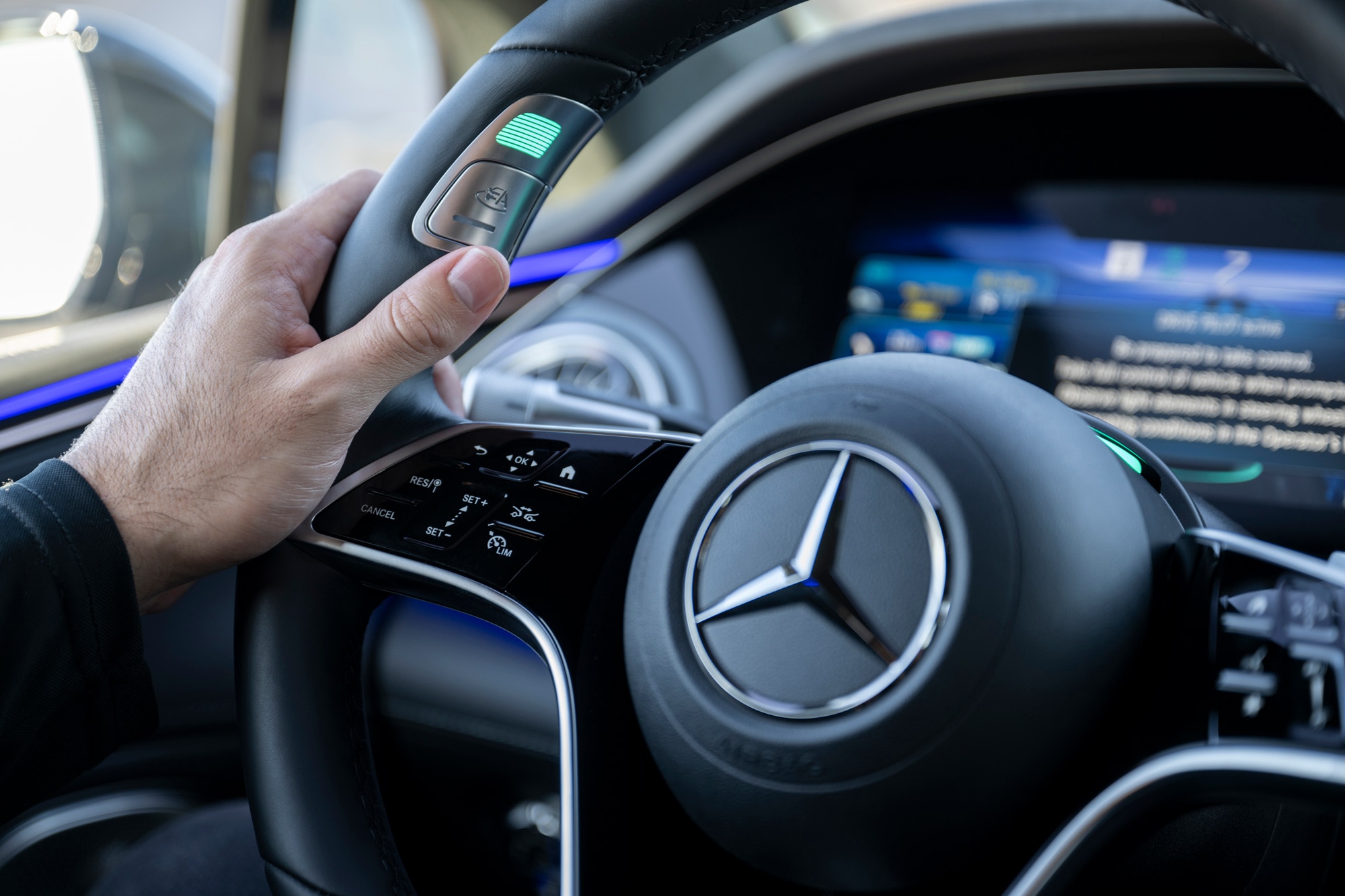 A driver demonstrates how Level 3 autonomous controls work in a Mercedes-Benz.