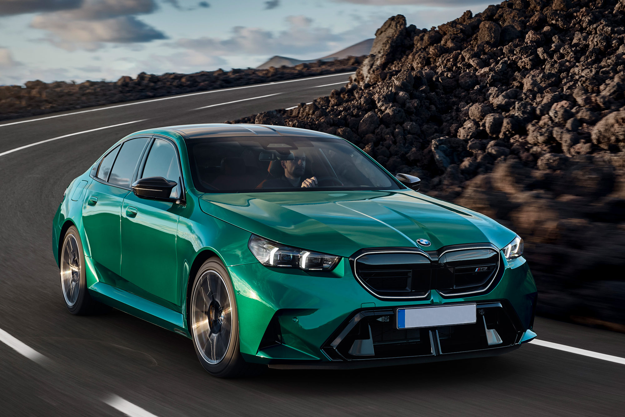 Front of a green 2025 BMW M5