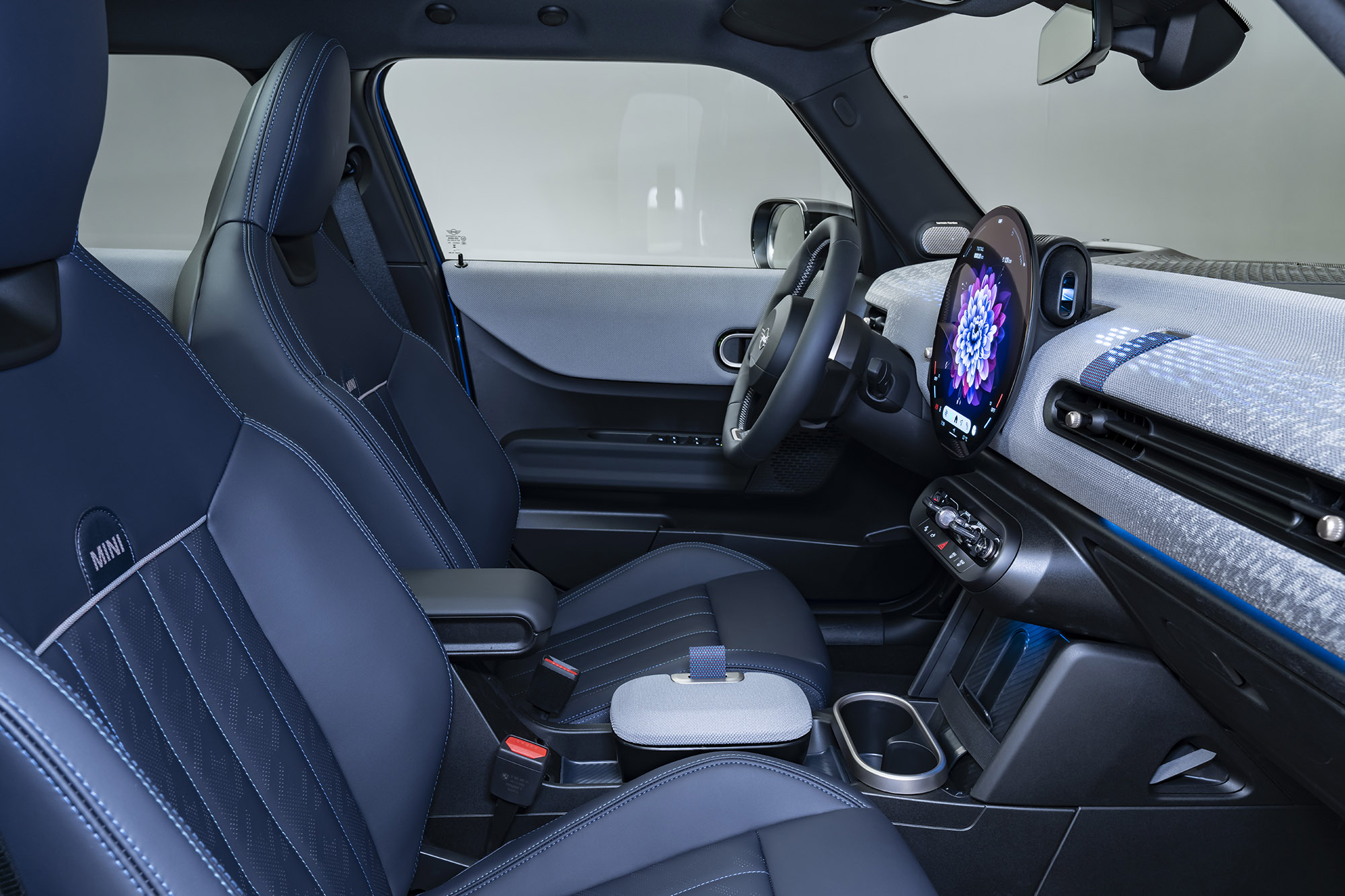 2025 Mini Cooper 4-Door interior in blue, front cabin