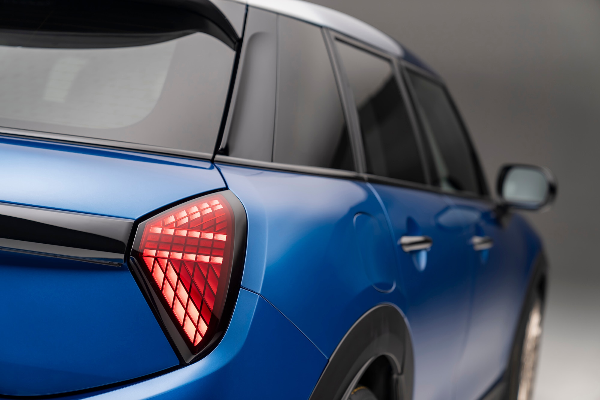 2025 Mini Cooper S 4-Door in blue, rear-right corner taillight detail