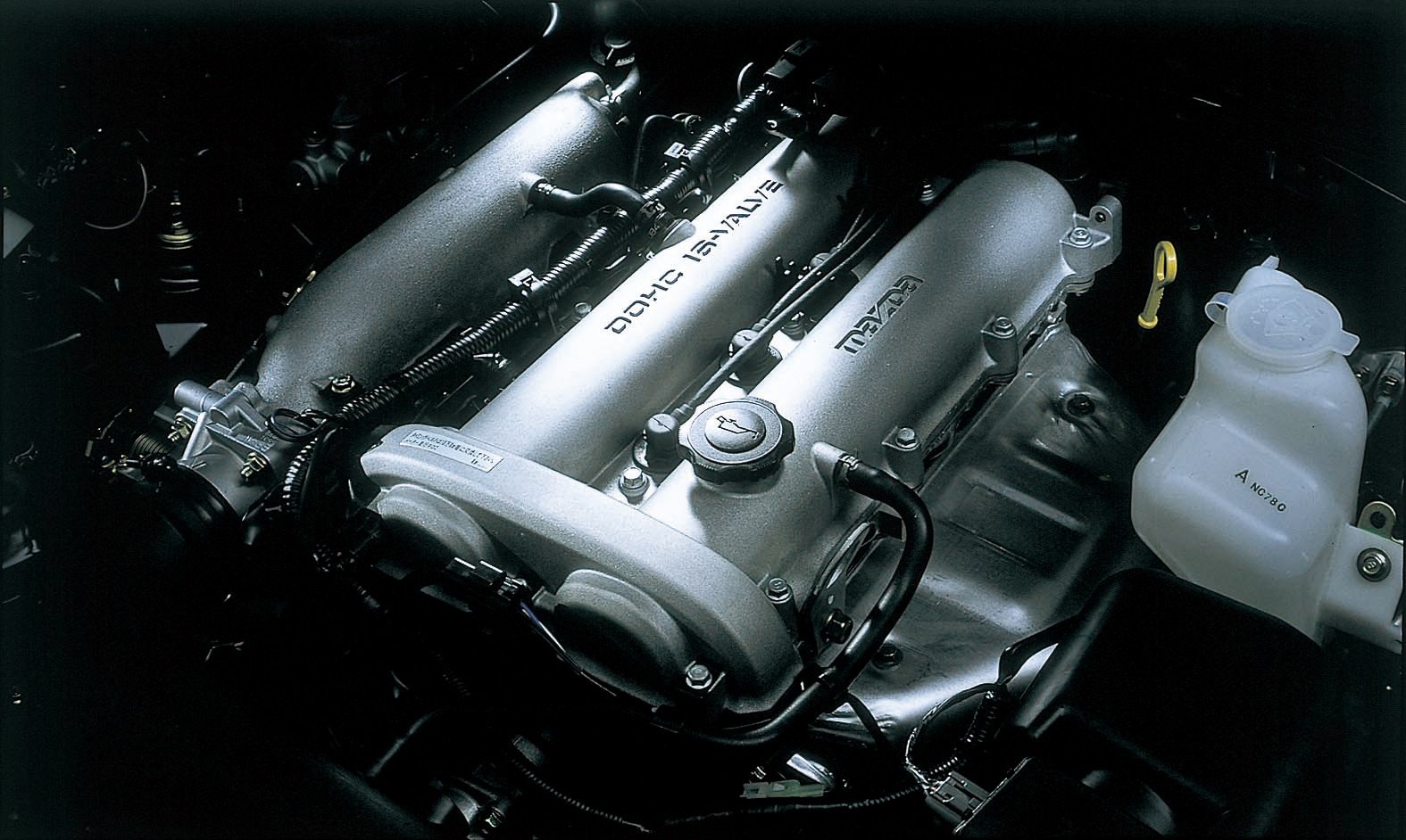 Detail shot of a 1.6-liter Mazda Miata engine