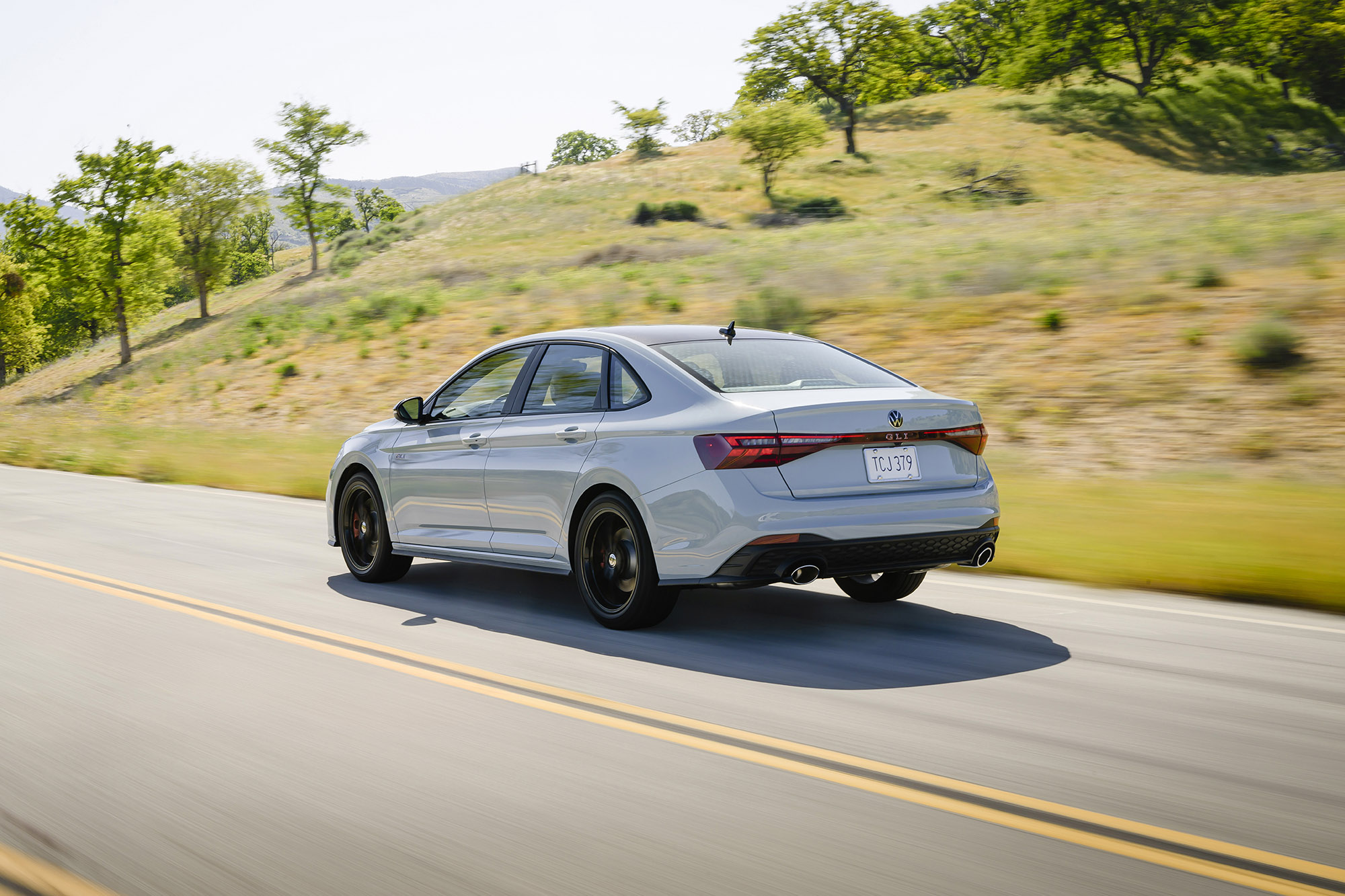 2025 Volkswagen Jetta GLI in light gray, rear