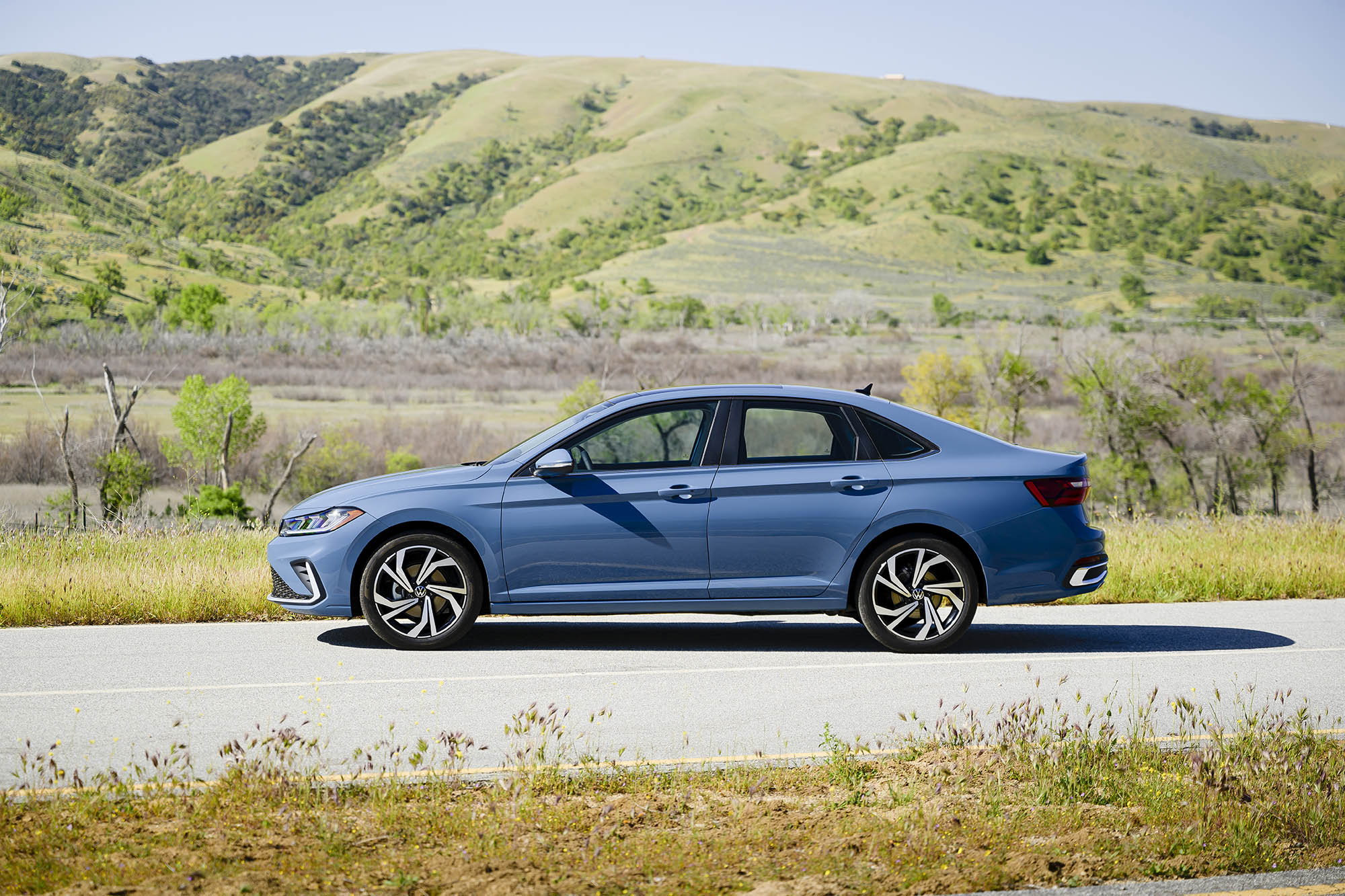  2025 Volkswagen Jetta in blue, side profile