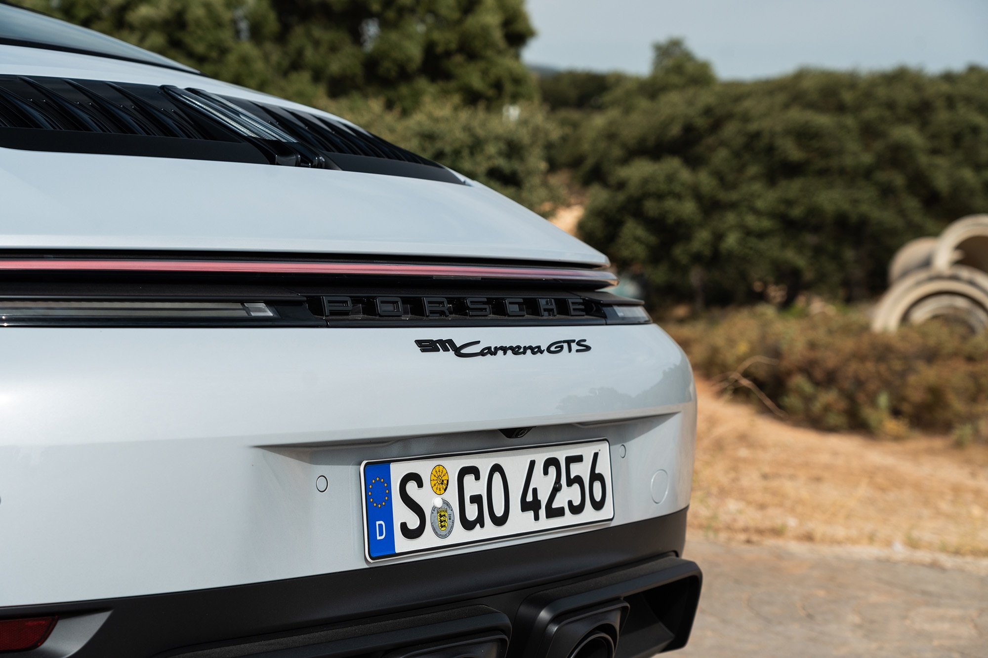 2025 Porsche 911 Carrera GTS Cabriolet in Ice Gray, rear bumper detail