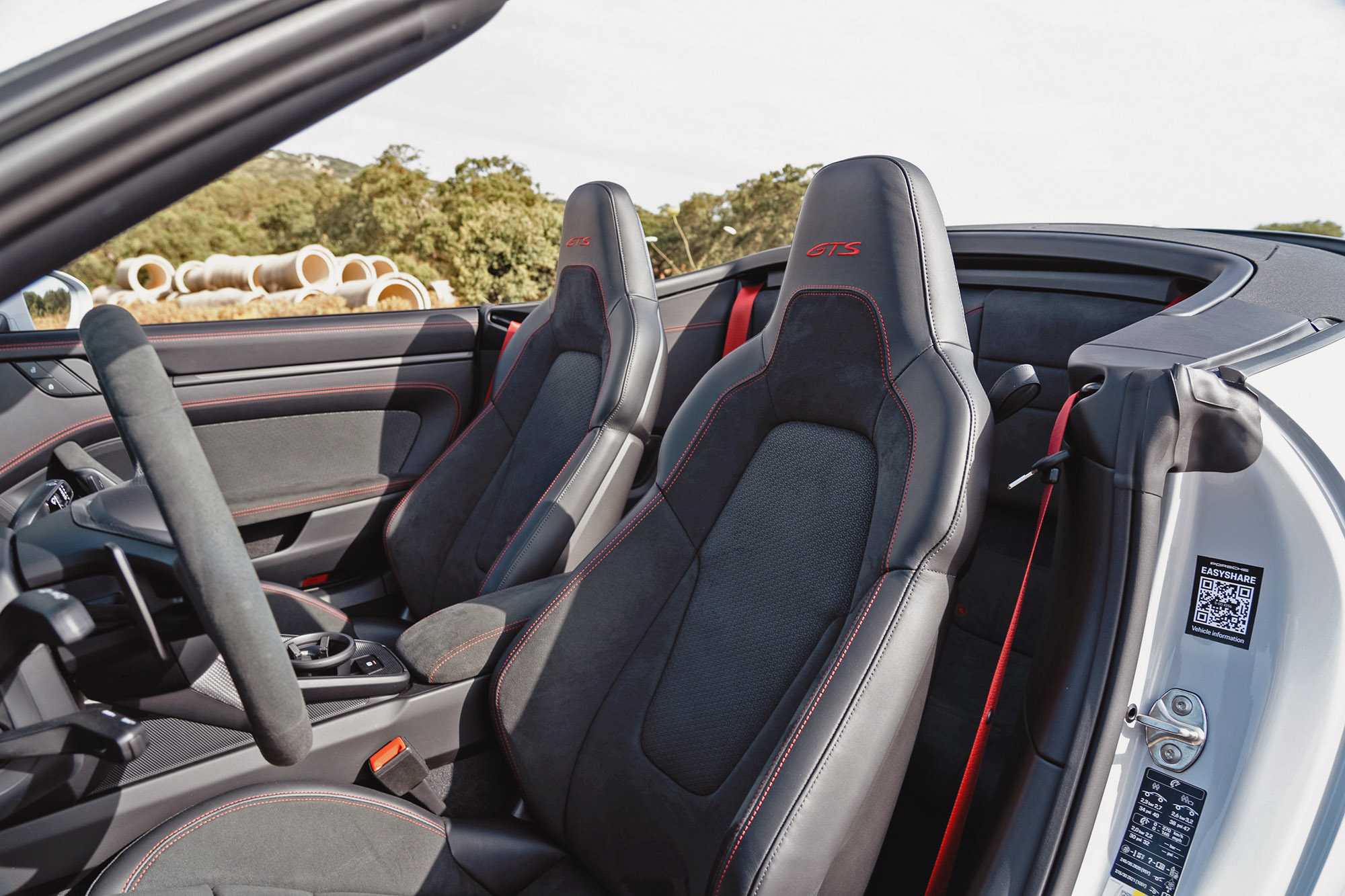 2025 Porsche 911 Carrera GTS Cabriolet interior, front seats, top down