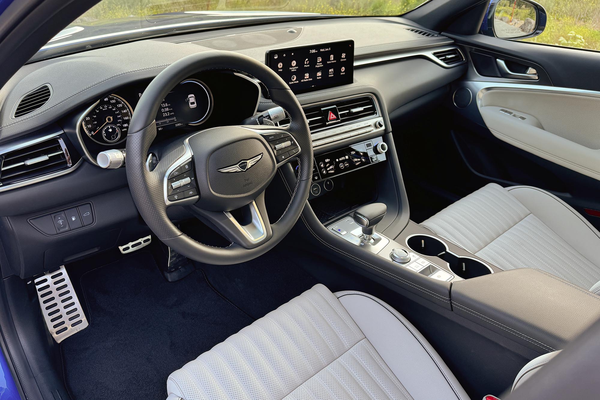 View of a 2024 Genesis G70 2.5T Sport Prestige interior showing the dashboard