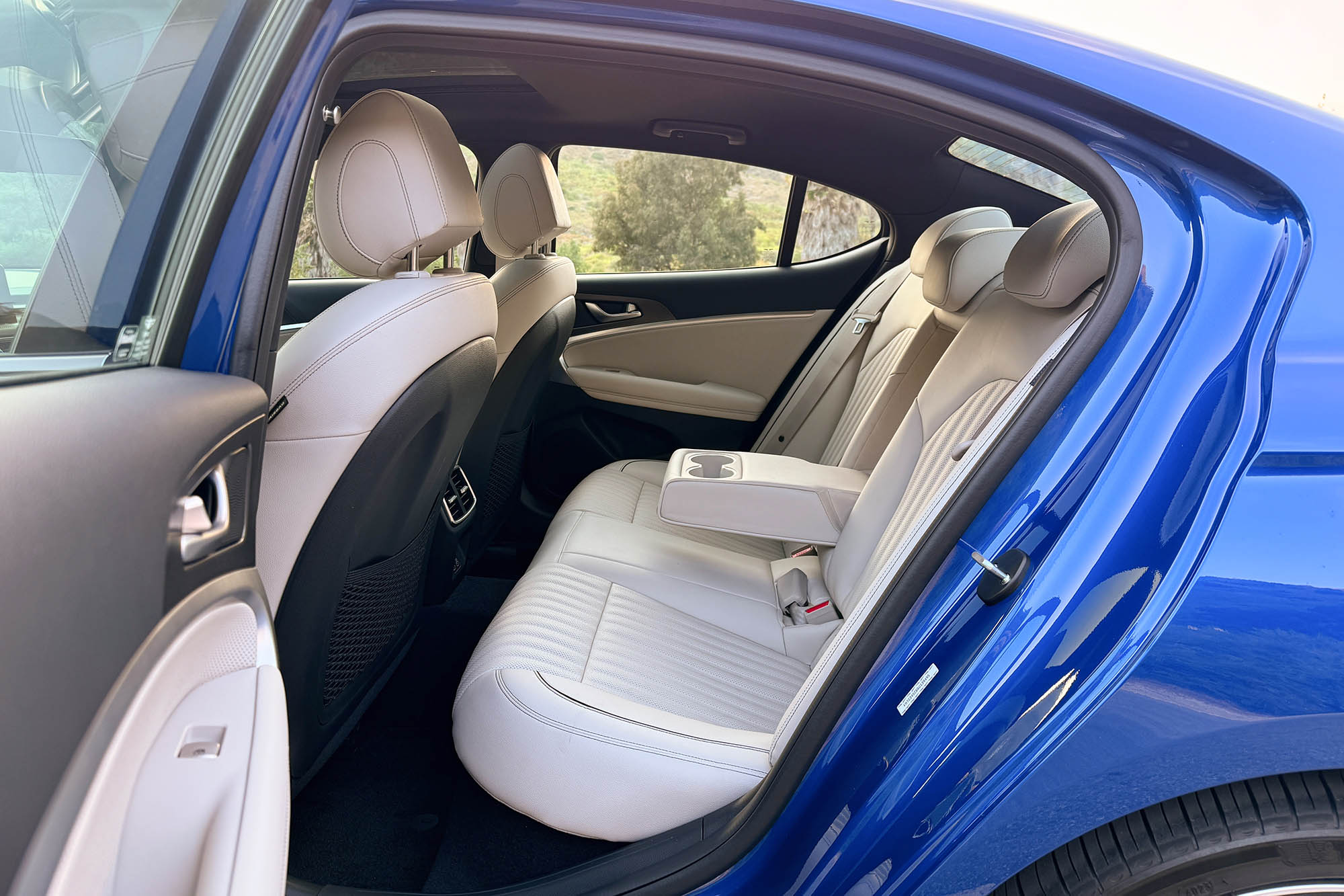 View of a 2024 Genesis G70 2.5T Sport Prestige interior showing the back seats