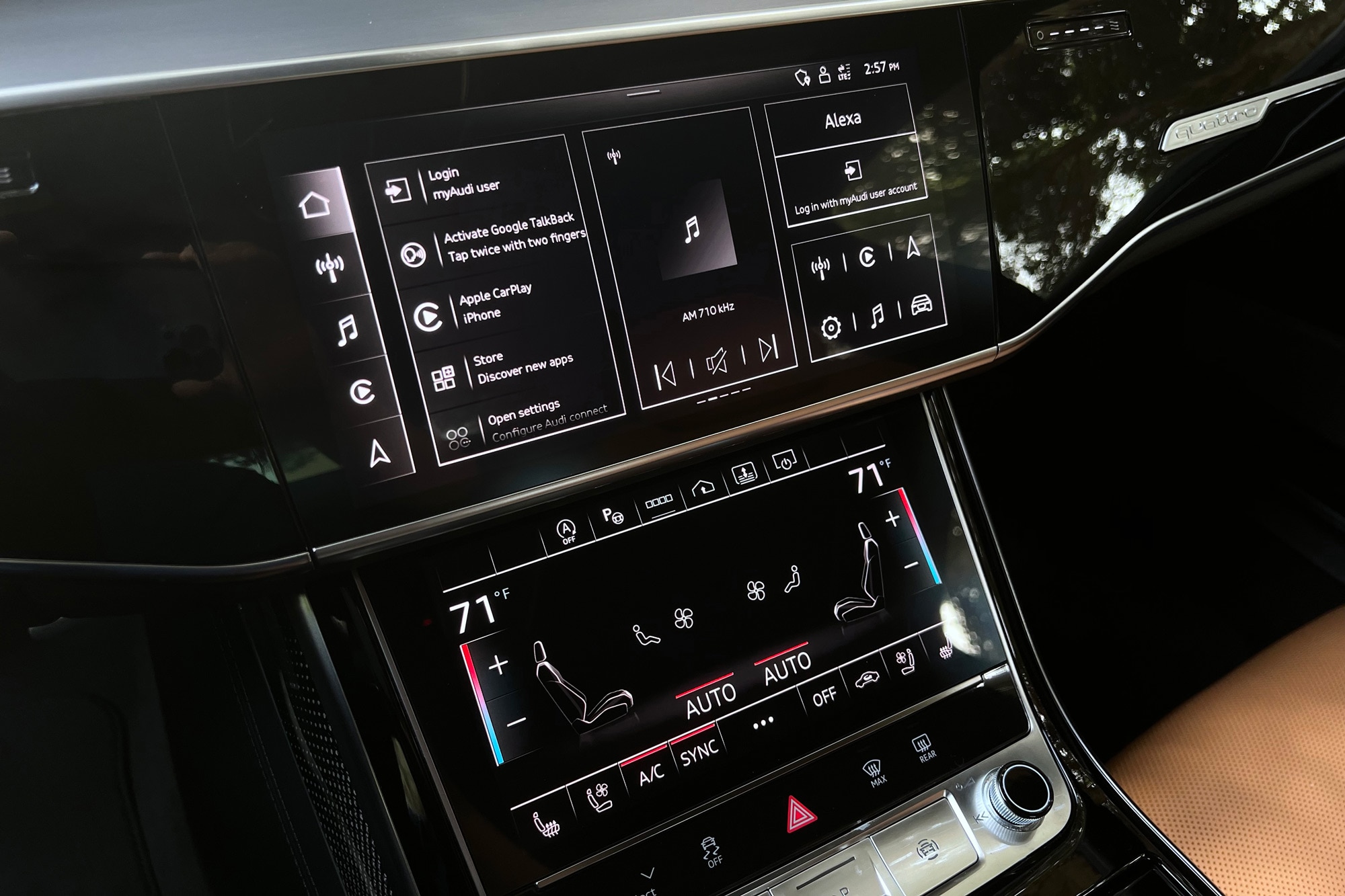 2024 Audi S8 interior showing the infotainment and climate control touchscreen displays.