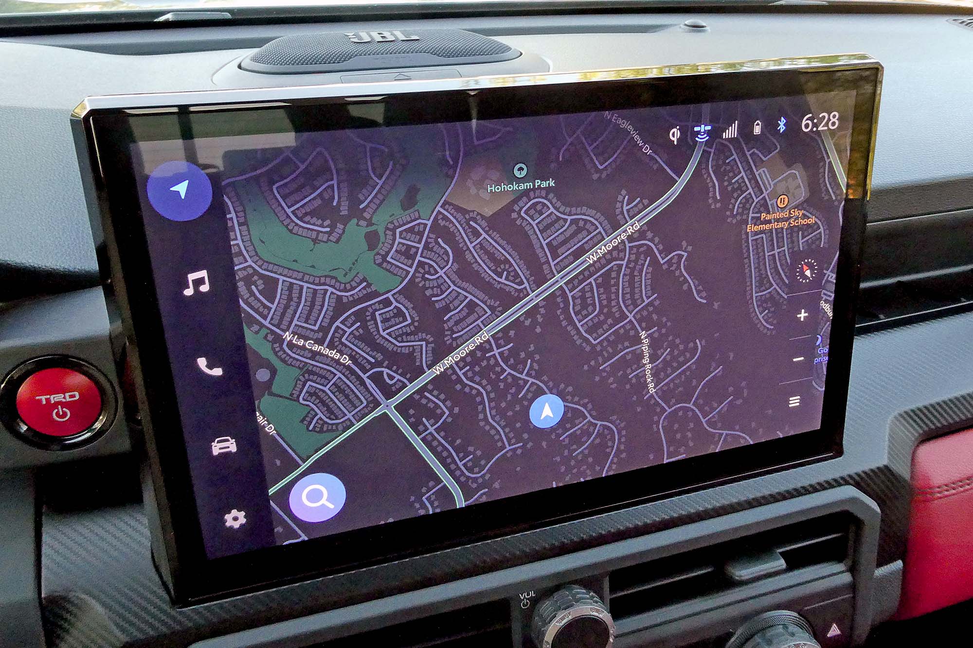 View of a 2024 Toyota Tacoma TRD Pro interior showing the infotainment system's navigation map.