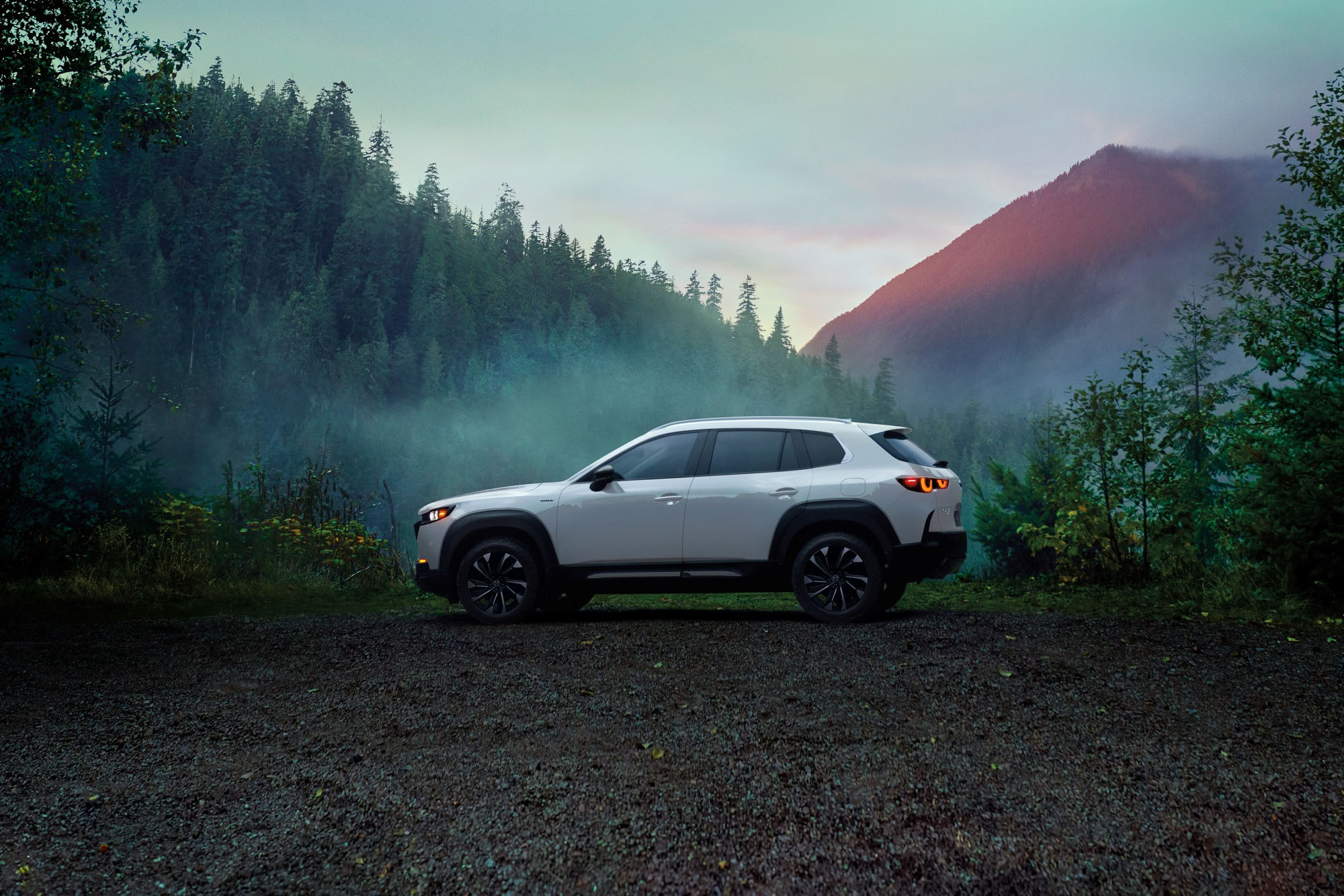 2025 Mazda CX-50 Hybrid in white, side view